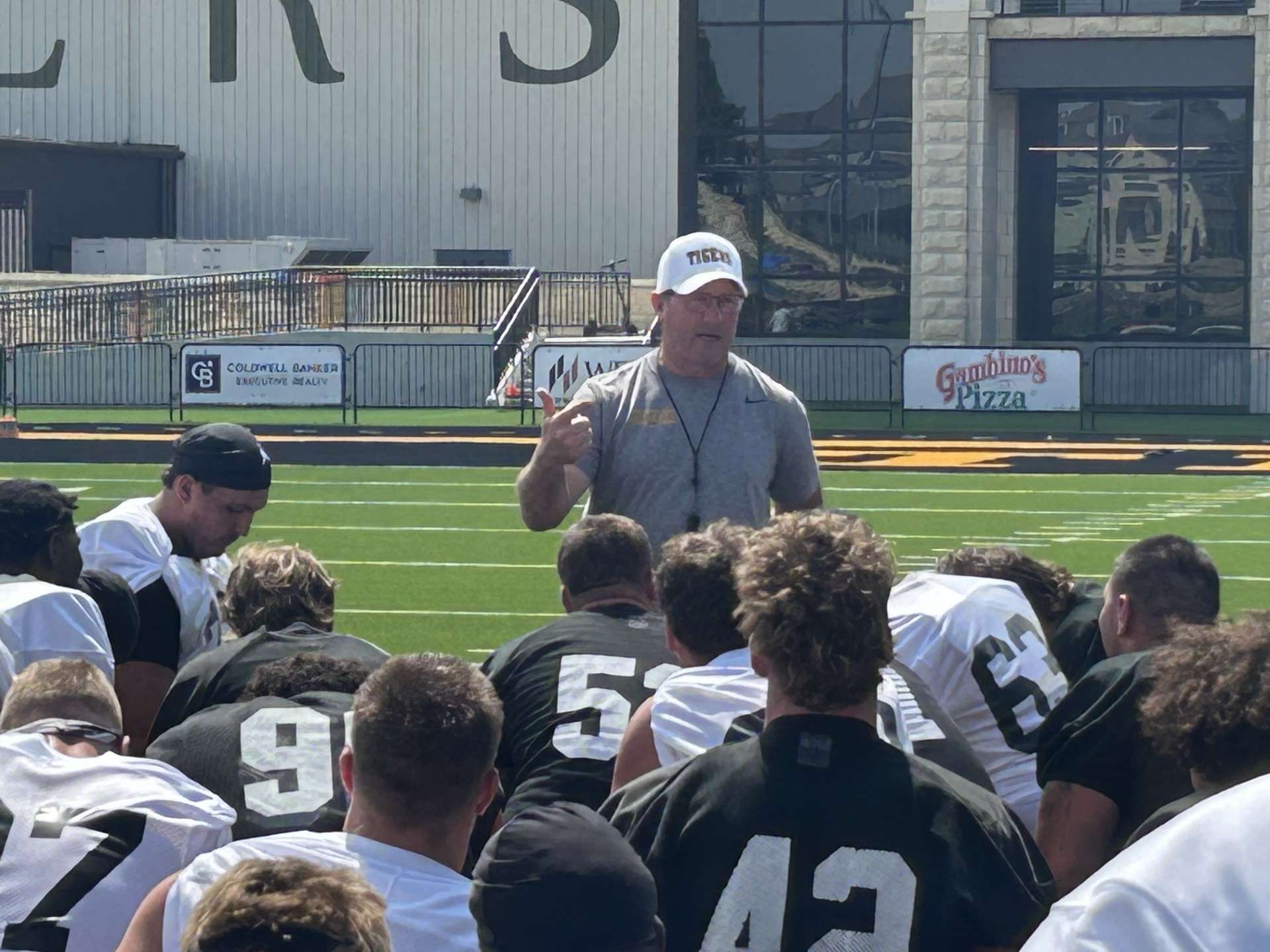 Fort Hays State football coach Chris Brown addresses his team following their first practice of preseason camp on Monday, August 3, 2026 at Lewis Field in Hays, Kan. (Hays Post photo)