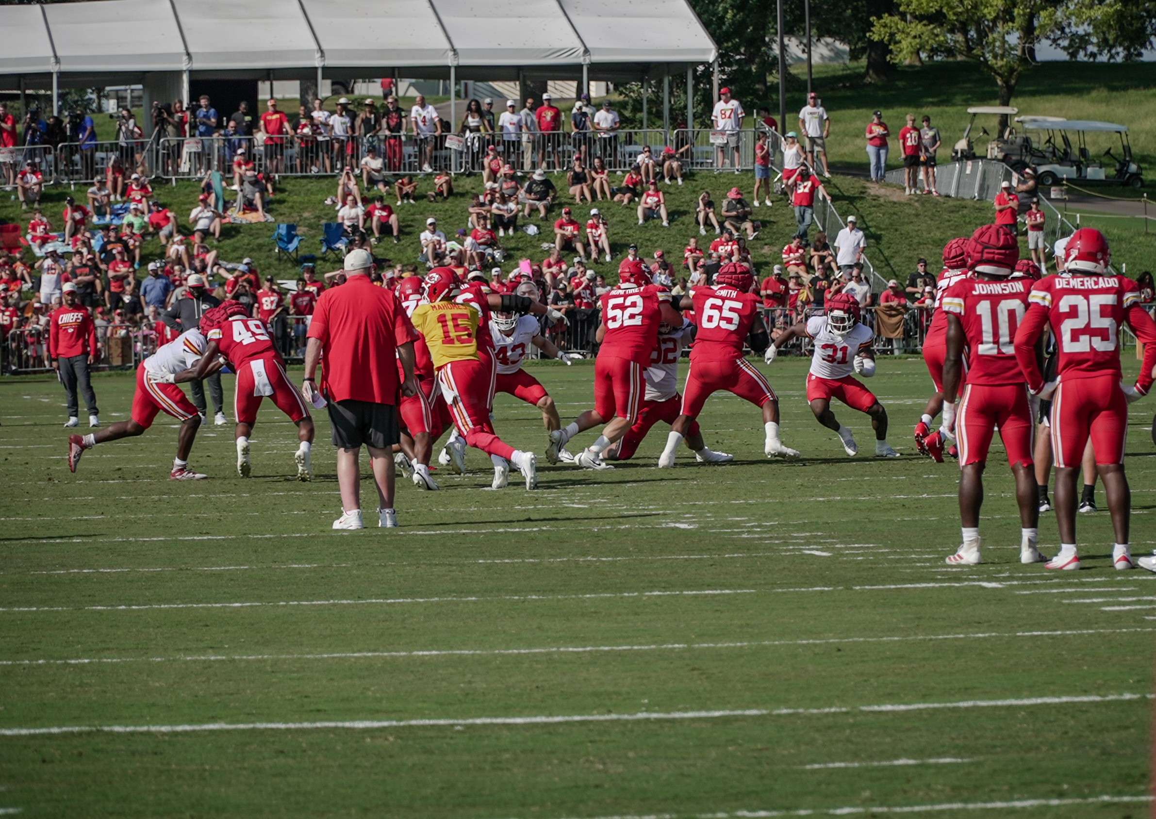 Trey Smith (65) and Creed Humphrey (52) block during a 7-on-7 drill during Chiefs Training Camp/ Photo by Justin Peacock