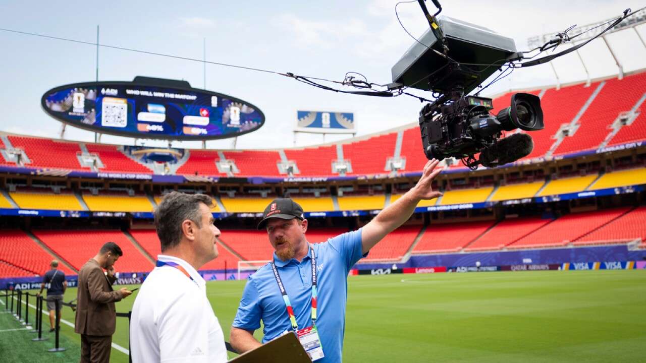 Broadcast staff worker prepare the overhead spider camera at Kansas City Stadium ahead of the World Cup quarterfinal match between Argentina and Switzerland, Friday, July 10, 2026 in Kansas City, Mo. (Peter Klaunzer/Keystone via AP)