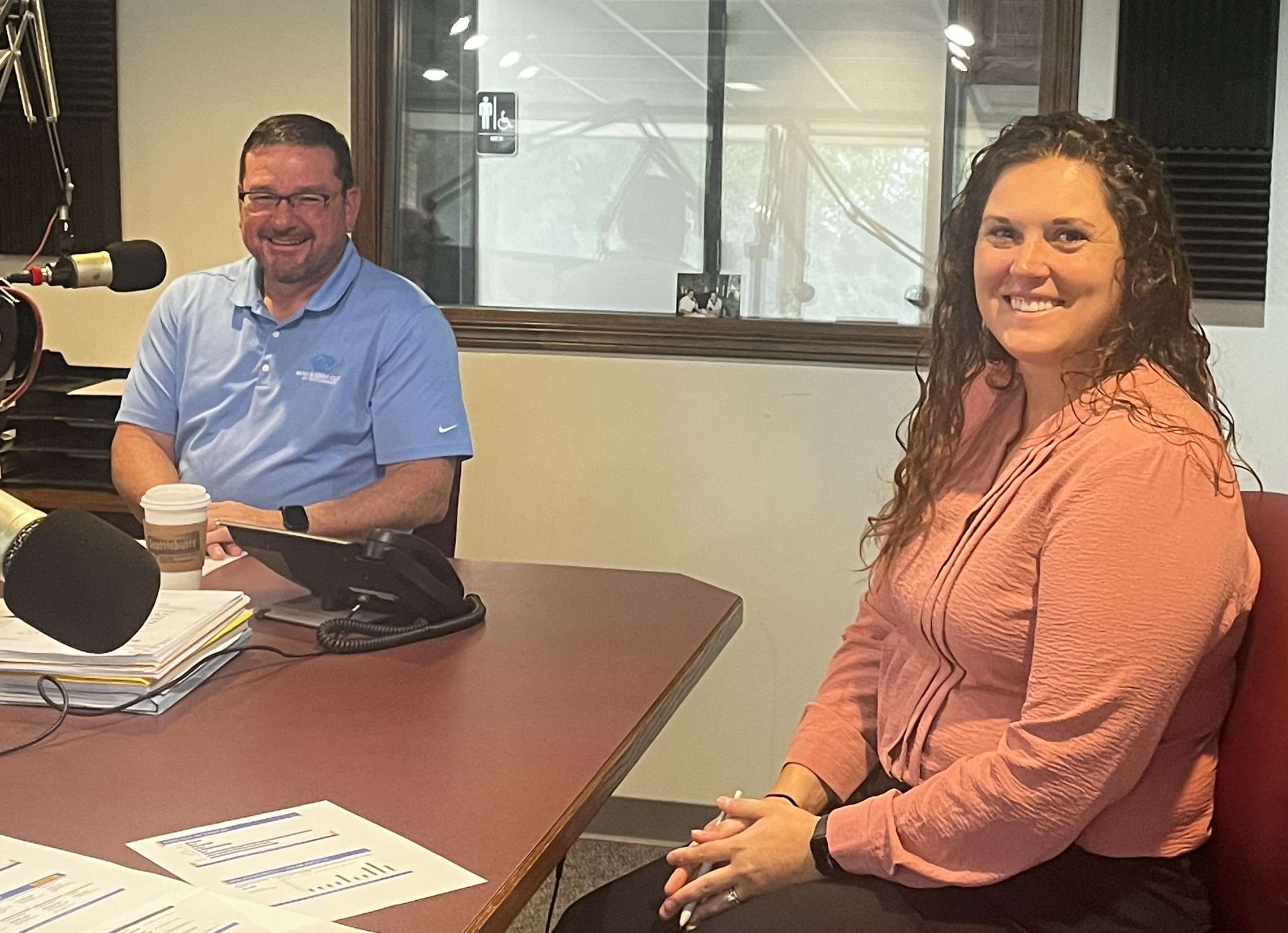 Lance Patterson (L) USD 308 BOE President, and Abby Stockebrand, CFO for USD 308 (R) - Hutch Post Photo