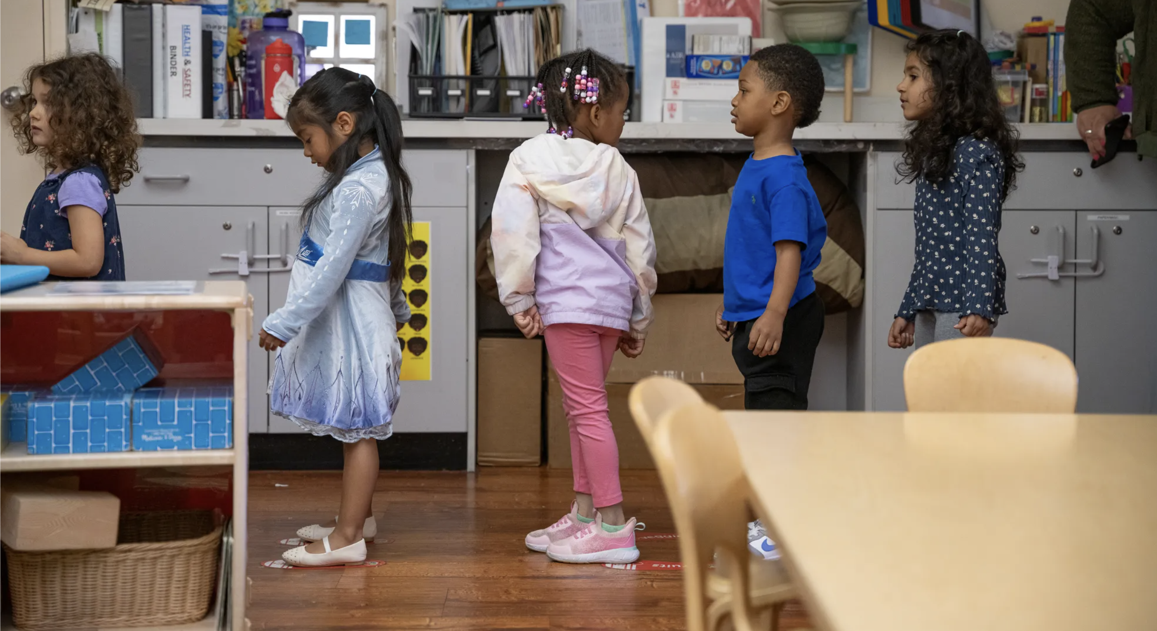 Preschool children line up to go outside at the Ralph Hawley Head Start Center in Emeryville, Calif., in December. The Trump administration has proposed major changes to the Head Start program. (Photo by Florence Middleton for CalMatters)