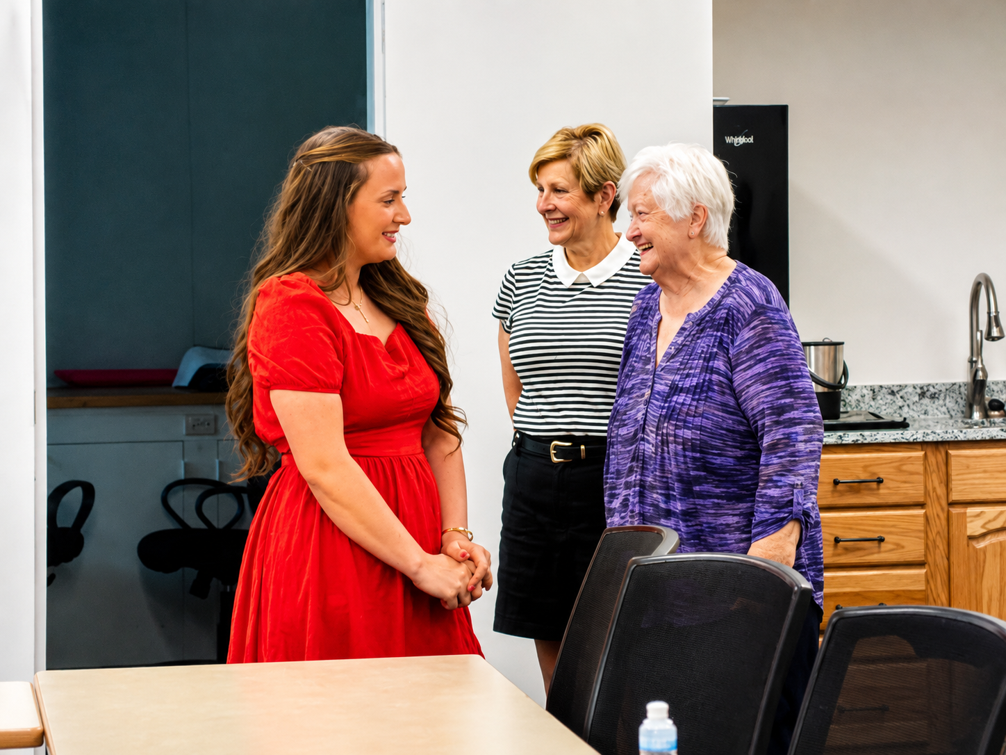 Local author Calie Troyer visits with Marilyn McGahan, president of PEO Chapter EB, following the presentation of donated copies of Chase the Dream 'Til You Can't to North Platte Public Schools media specialists. (Allison Peck | The Post)