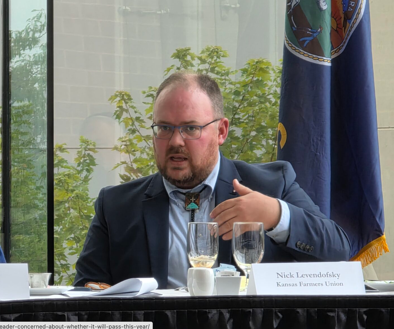 Nick Levendofsky (right), executive director of the Kansas Farmers Union, is concerned the failure to move a farm bill out of the Senate Agriculture Committee on Aug. 6, 2026, means the bill won't happen this year. He's show here during a U.S. Global Leadership Coalition meeting in 2025, in Overland Park. (Photo by Morgan Chilson/Kansas Reflector)