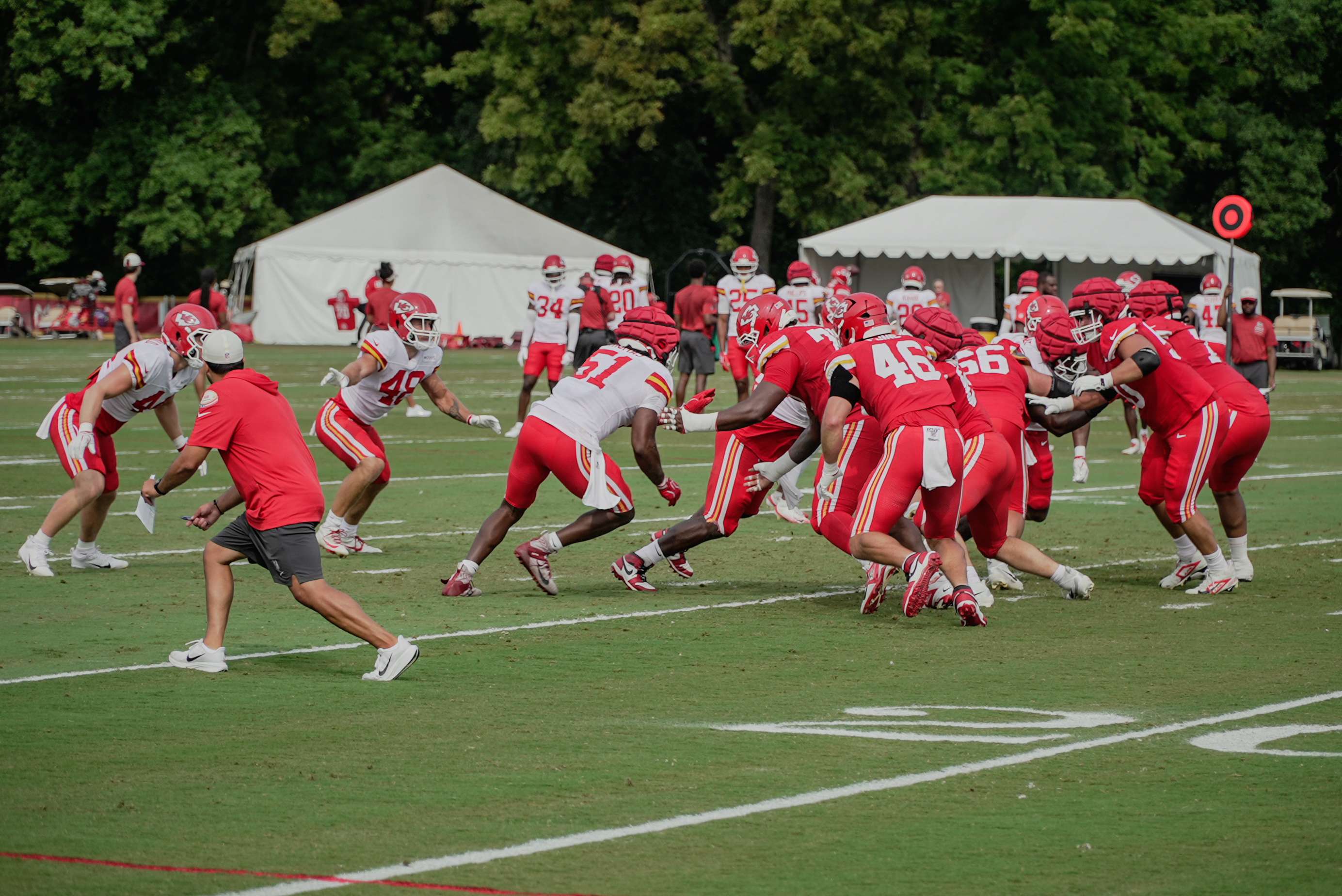Rookie defensive end R Mason Thomas (51)&nbsp; runs a drill during Chiefs Training Camp in St. Joseph at Missouri Western State University/ Photo by Justin Peacock