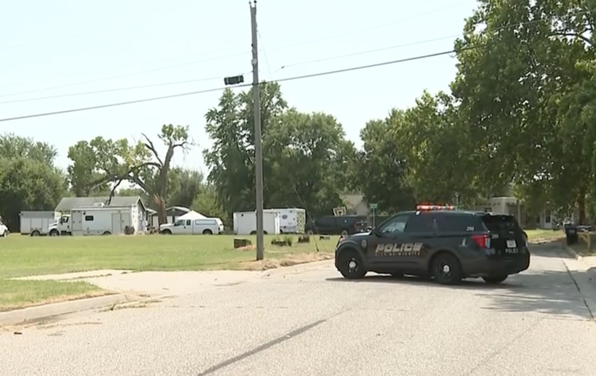 Police on the scene of the investigation -photo courtesy KWCH