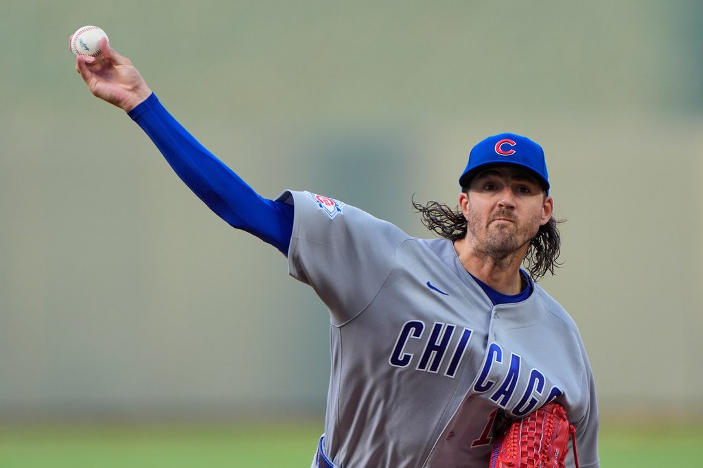 Chicago Cubs starting pitcher Kevin Gausman throws during the first inning of a baseball game against the Kansas City Royals, Friday, Aug. 7, 2026, in Kansas City, Mo. (AP Photo/Charlie Riedel)
