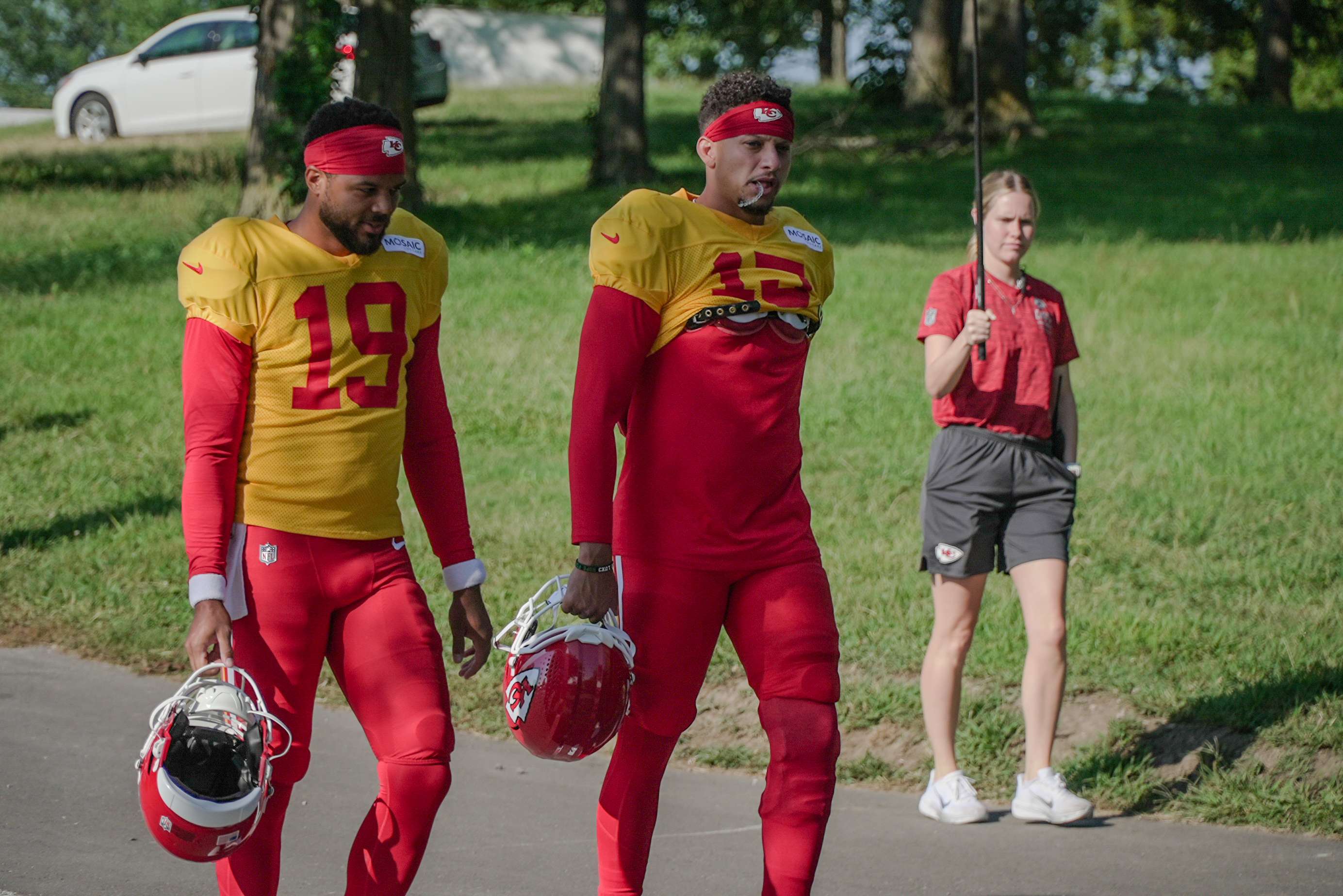 Patrick Mahomes walks down the hill to practice with backup quarterback Chris Oladokun/ Phtoo by Justin Peacock