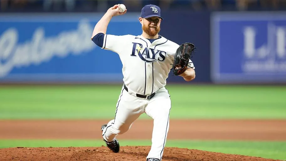 Jul 28, 2026; St. Petersburg, Florida, USA; Tampa Bay Rays pitcher Craig Kimbrel (46) throws a pitch against the Texas Rangers in the eighth inning at Tropicana Field. Mandatory Credit: Nathan Ray Seebeck-Imagn Images | IMAGN IMAGES via Reuters Connect