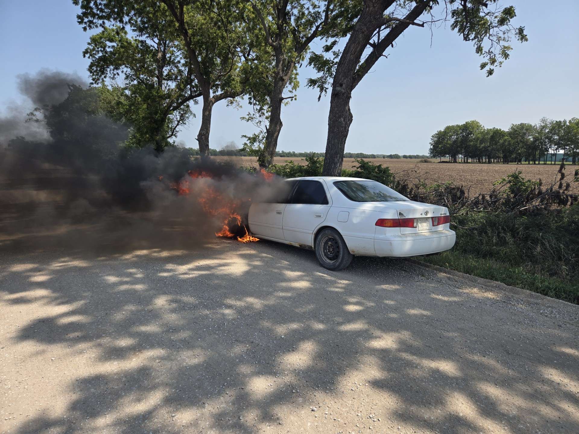 White 2001 Toyota Camry total loss after fire on August 7 - Saline County Sheriff photo