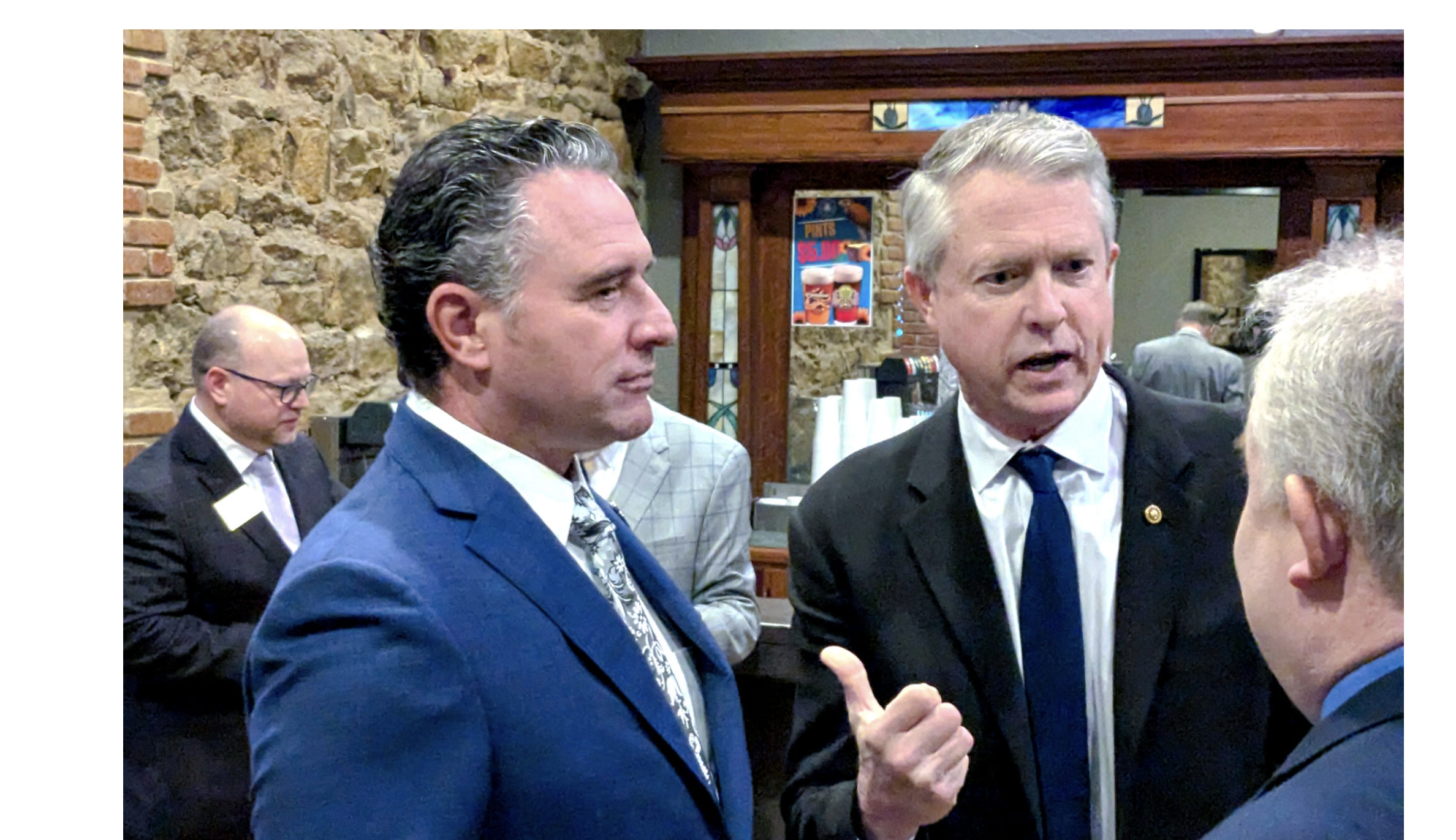  State Sen. Ty Masterson of Andover, left, won the Republican nomination for Kansas governor and U.S. Sen. Roger Marshall, R-Kansas, won the GOP nomination for U.S. Senate in August primaries. In this image from February 2025, Masterson and Marshall take part in a news conference in Topeka. (Photo by Tim Carpenter/Kansas Reflector)