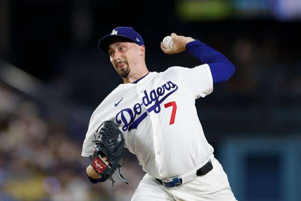 Los Angeles Dodgers starting pitcher Blake Snell (7) throws during the fifth inning of a baseball game against the Kansas City Royals, Tuesday, Aug. 11, 2026, in Los Angeles. (AP Photo/Caroline Brehman)