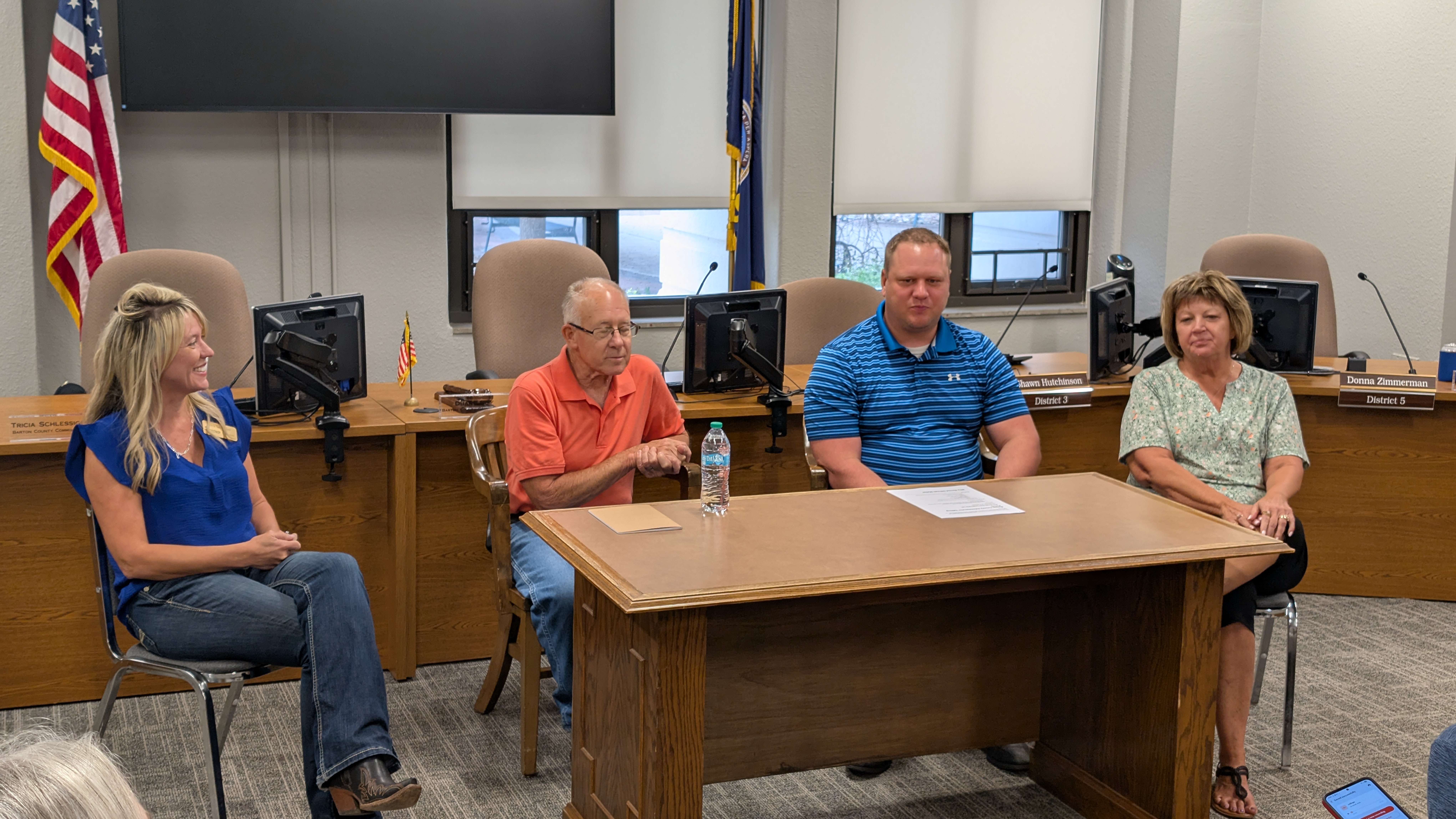 Participants taking part in the Great Bend Chamber of Commerce’s Run Ready initiative hear from Barton County Administrator Matt Patzner and County Commissioners Tricia Schlessiger, Duane Reif and Donna Zimmerman on July 29 in Great Bend, Kansas.