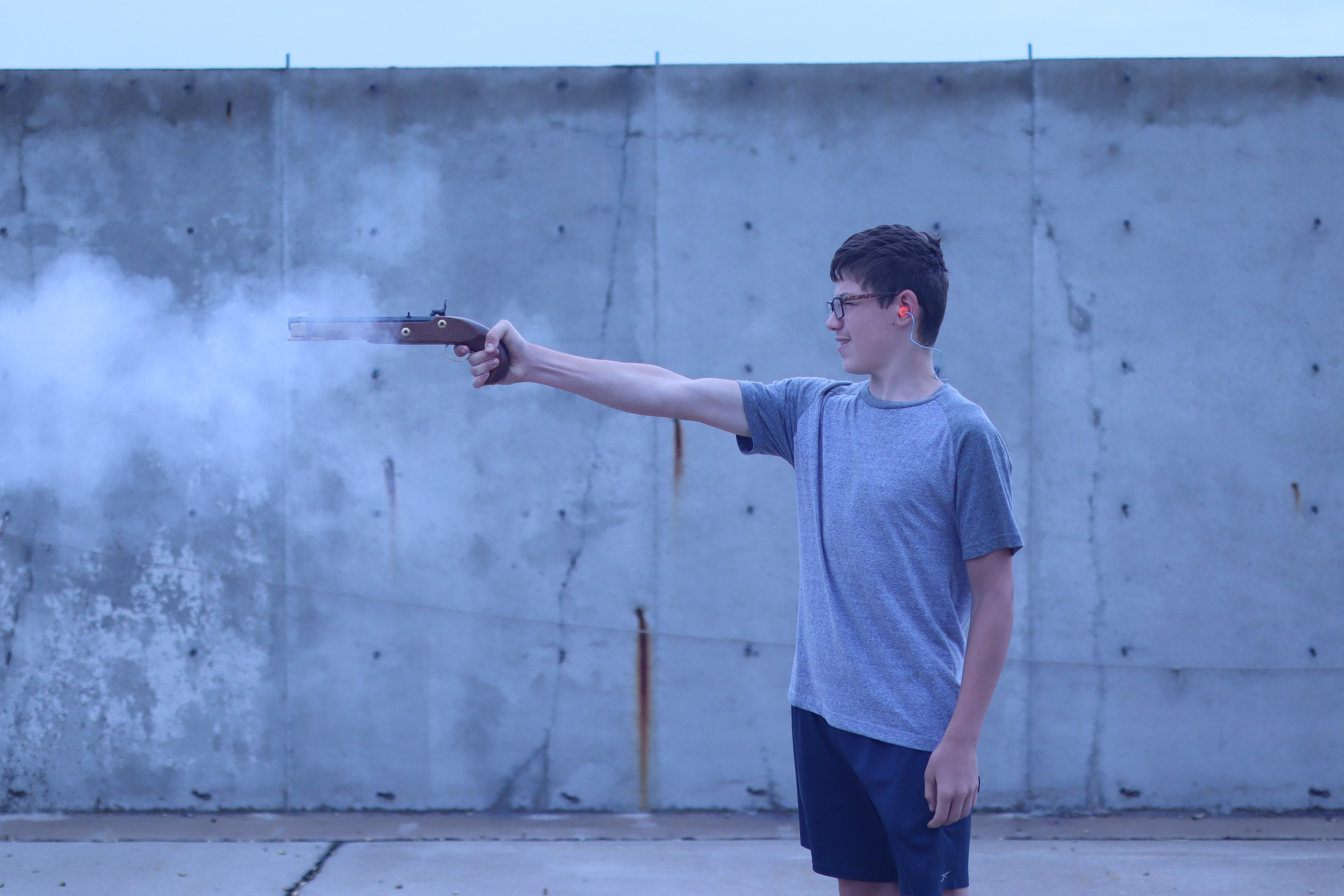 Lance Smith shooting a replica of a flintlock pistol at the 29th Youth Outdoor Festival.&nbsp;