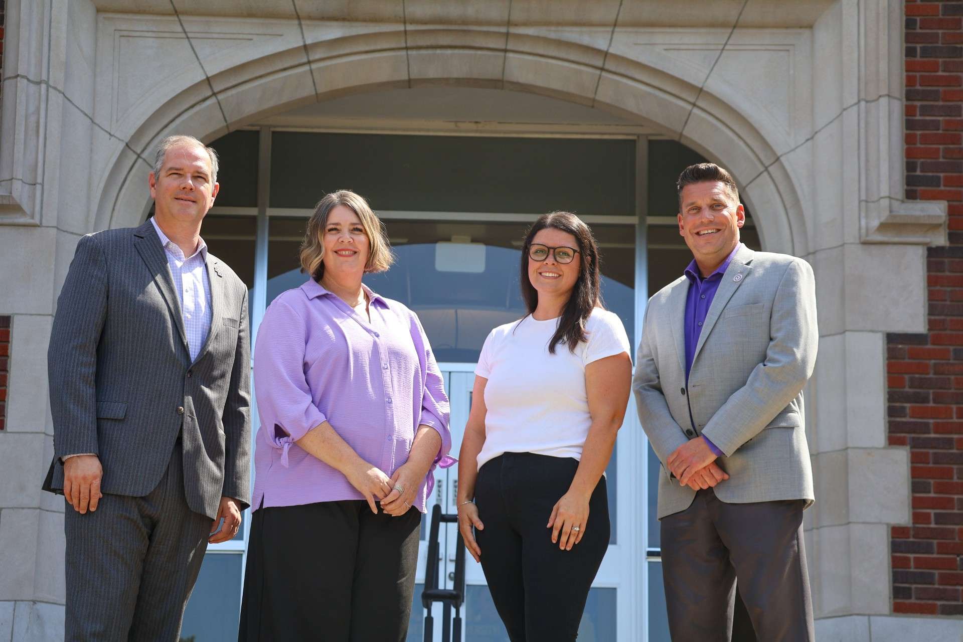 (L to R) Dr. Matt Thompson, president; Dr. Kelly Moore, Social Work program director; Prof. Bridget Goodness, assistant professor of Social Work and field experience director; Dr. Damon Kraft, provost and executive vice president for student success - Skylar Nelson/KWU