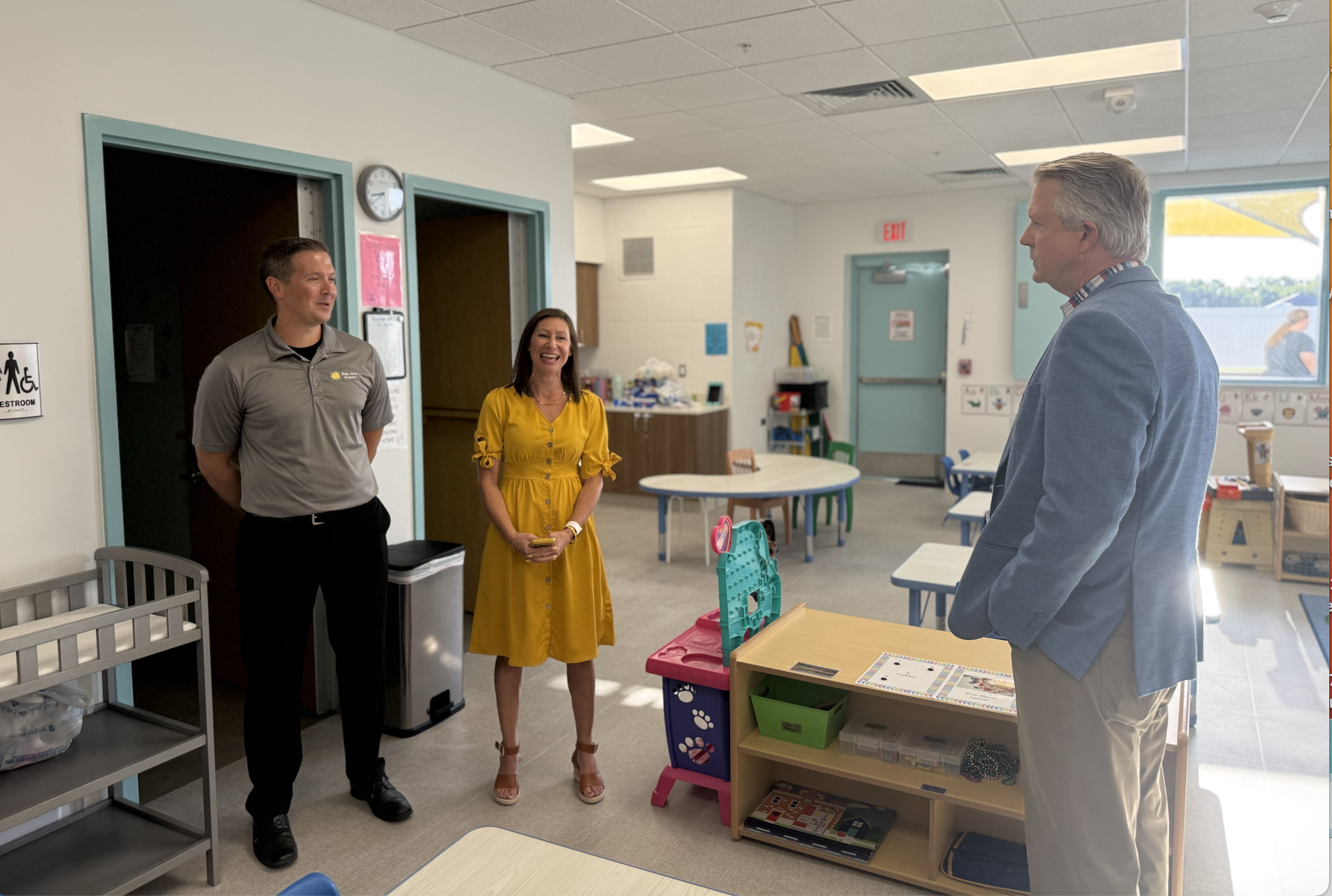 From left: Nick and Andrea Felder, owners of Bright Minds Academy, with Sen. Roger Marshall, R-Kansas, as he tours the day care facility that the Felders operate at the Bob and Pat Schmidt Community Center in Hays. Photo by Cristina Janney/Hays Post