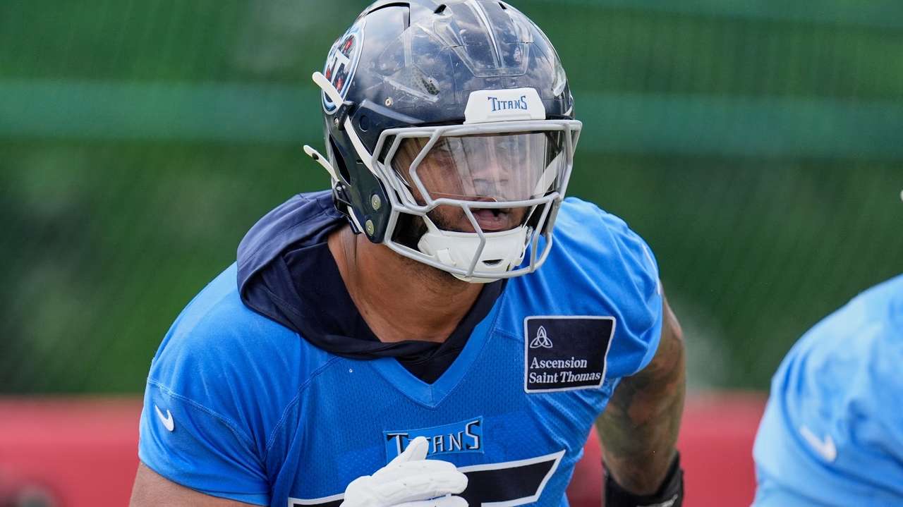 Tennessee Titans offensive tackle Dan Moore Jr. (75) runs through a drill during an NFL football practice Tuesday, June 3, 2025, in Nashville, Tenn. (AP Photo/George Walker IV, File)