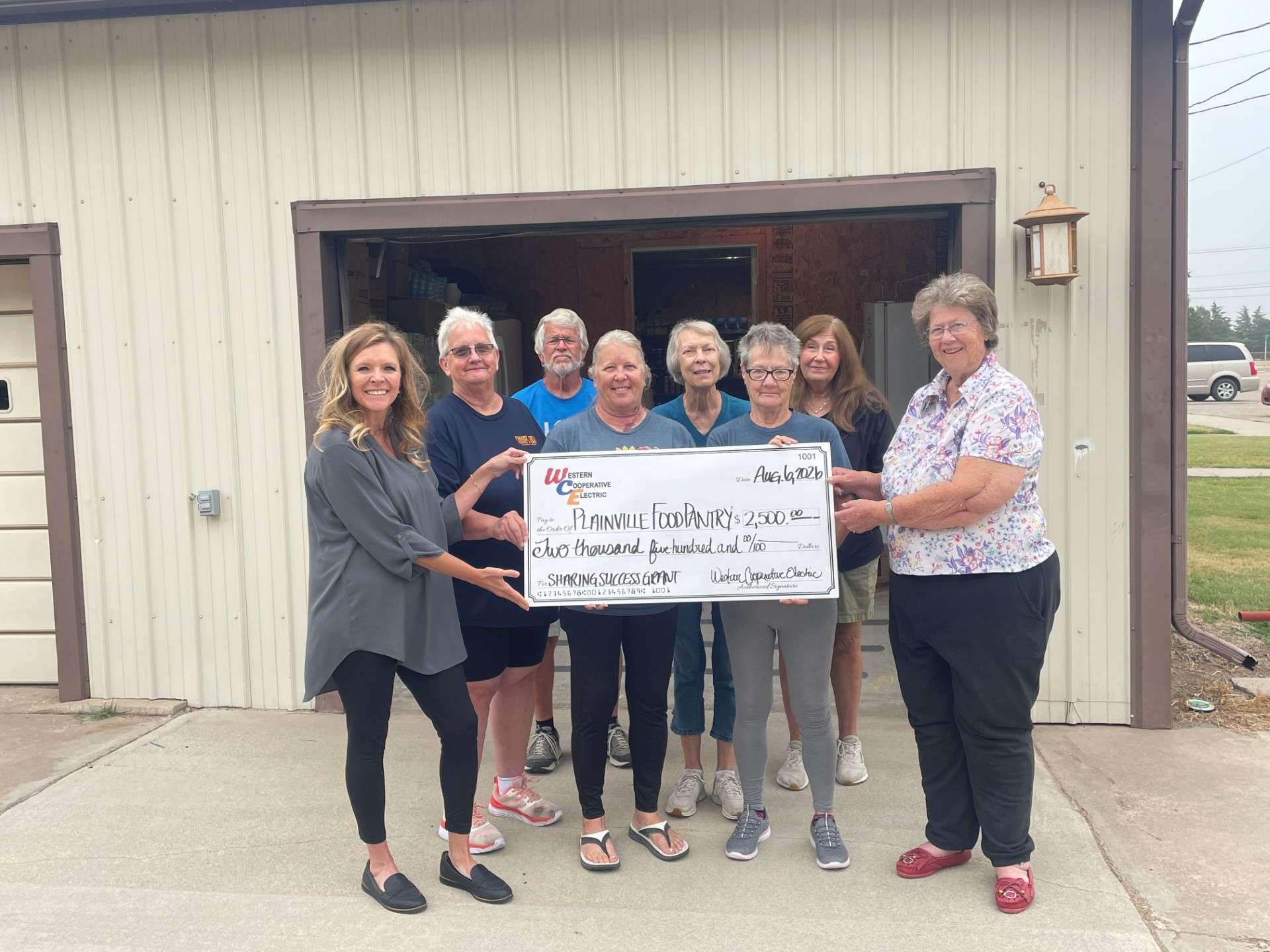 Christina Hayes (WCE Member Services Manager) and food bank volunteers Jeanie Rolfe,&nbsp; Mark Glendenning, Kim Knouf, Nan Hilgers, Lola Meitler, Susan Rank and Janet Swafford, director. Courtesy photo