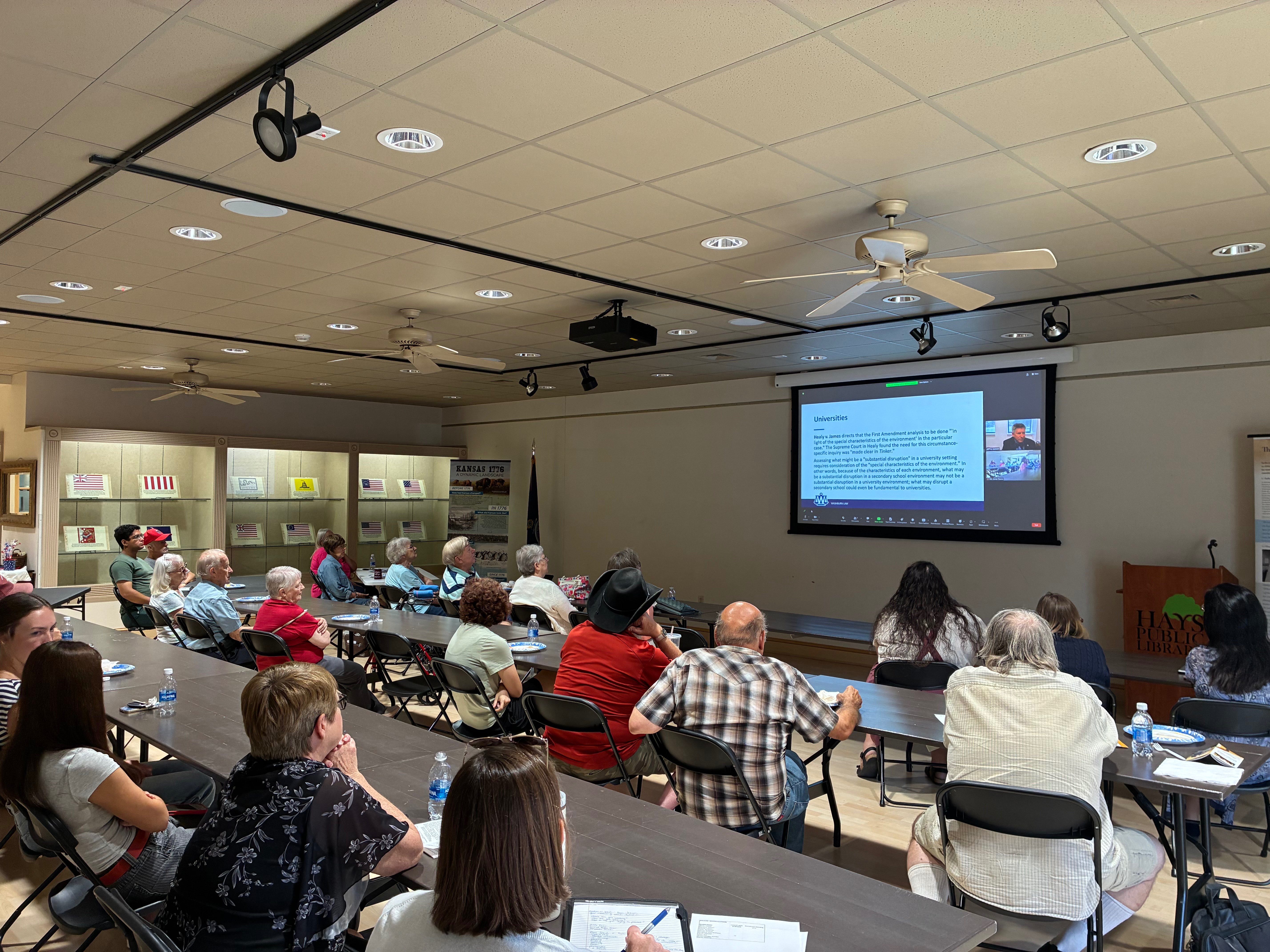 Attendees listen as Jeffrey D. Jackson, from Washburn Law University, presents on the First Amendment and freedom of speech through Zoom during the Hays Public Library’s Lunch and Learning event. Photo by Alin Hett/Hays Post