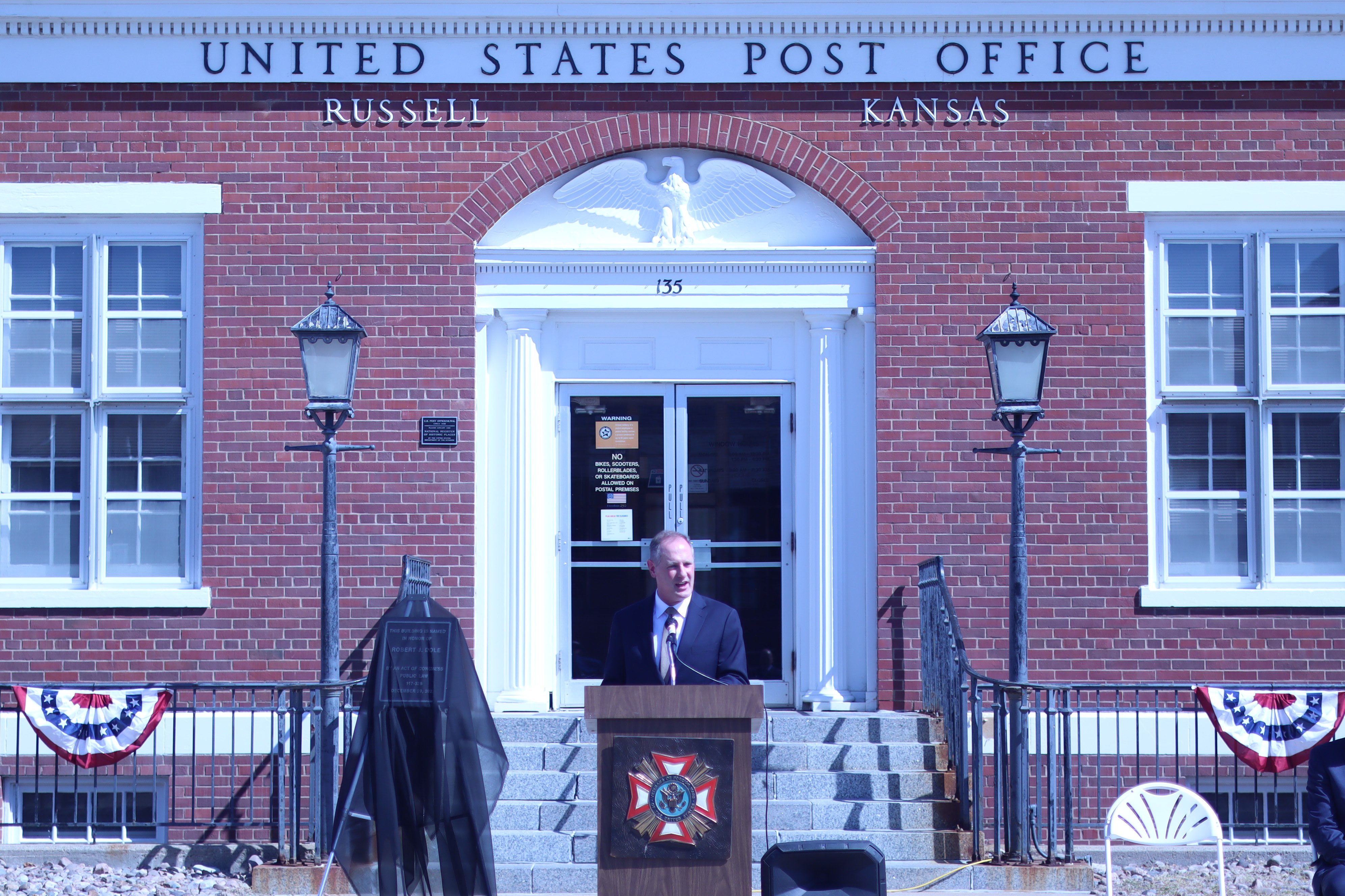 U.S. Rep. Tracey Mann speaks during the ceremony renaming the Russell Post Office after former U.S. Sen. Bob Dole.<br>