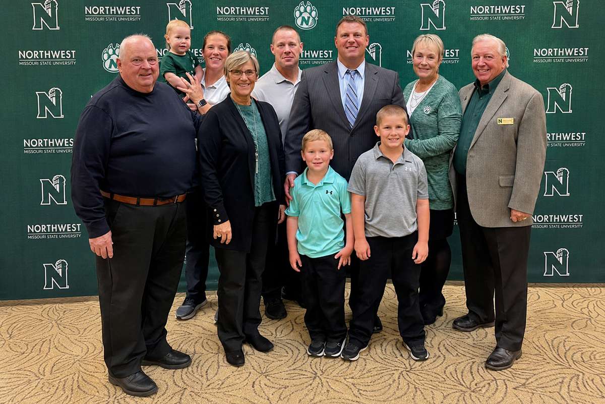 The Woolsey family is pictured in 2021 at Northwest. Left to right are the late Dr. Wayne Woolsey, Kenna Woolsey, Katie Scherer Woolsey, Nancy Jordheim Woolsey, Tucker Woolsey, Colton Woolsey, Dr. Conrad Woolsey, Westin Woolsey, Dr. Barbara Tiffin Woolsey and Dr. Ron Woolsey/ Photo courtesy of Northwest Missouri State University