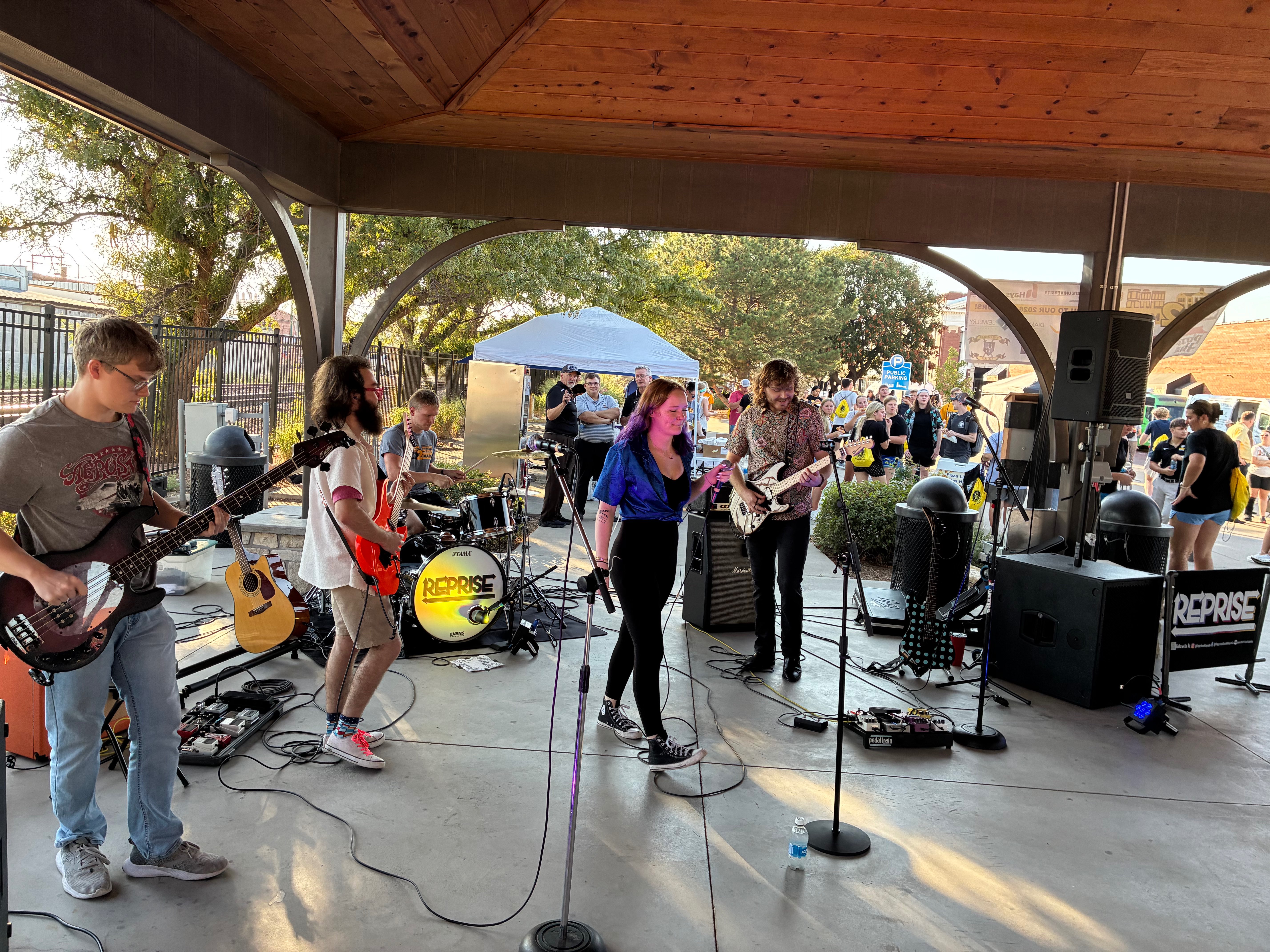 Members of the band Reprise perform live at the Downtown Pavilion during March 2 Main 2026.&nbsp;