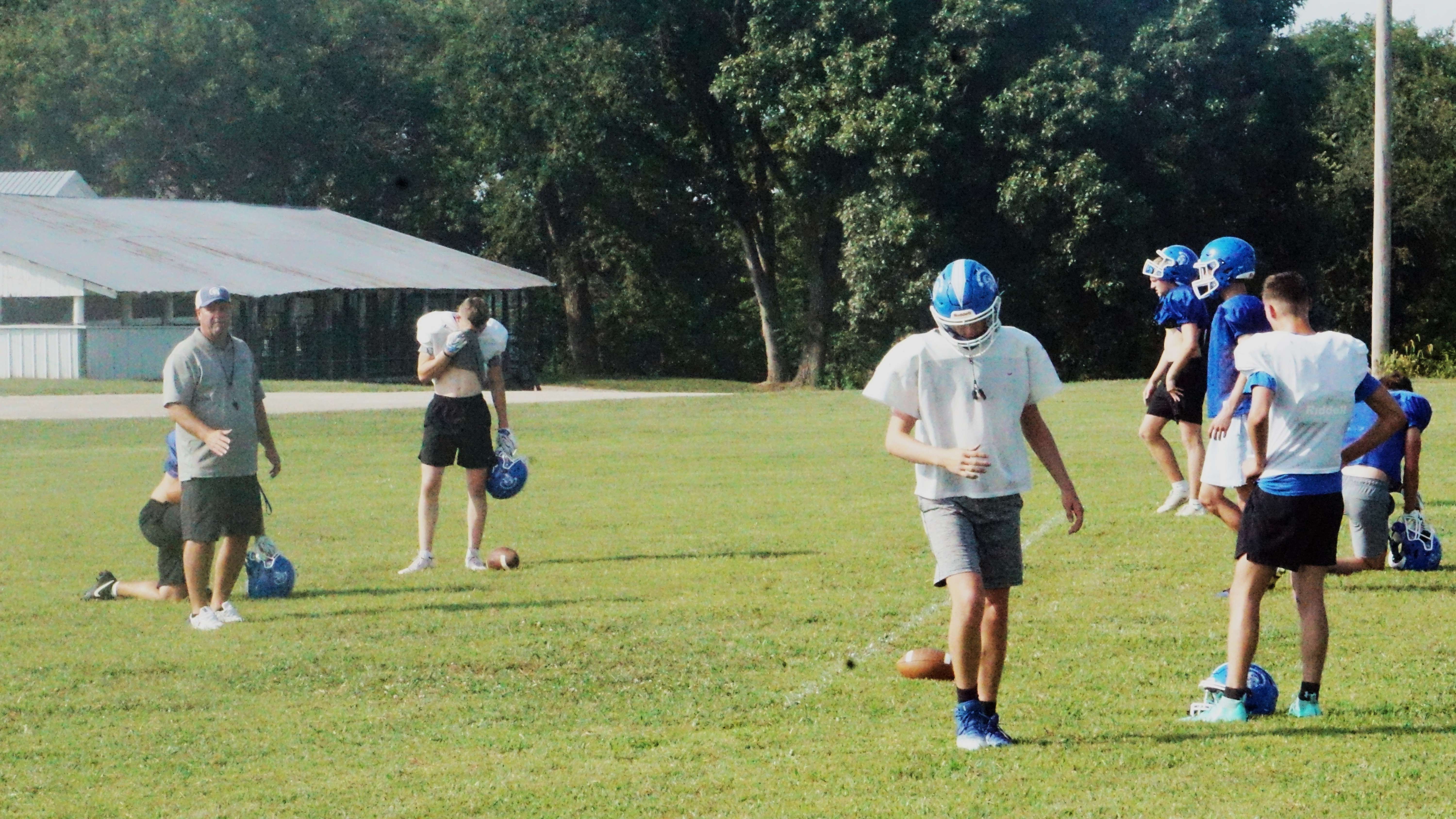 Head Coach Derek Jasper sets up a receiving drill during practice for the Troy Trojans/ Photo by Matt Pike