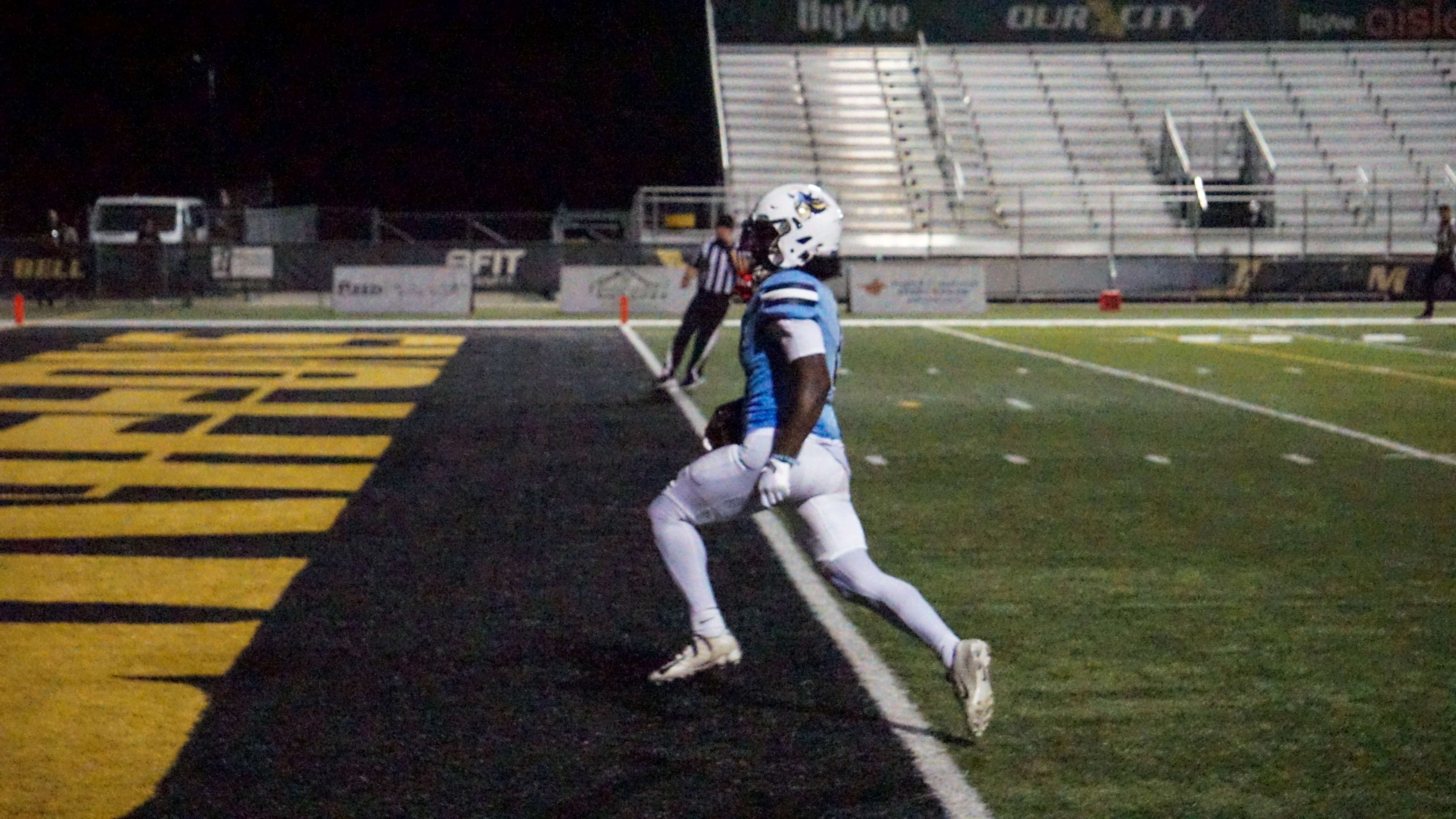 Neal May trots across the goal line taking a punt return back 84 yards to put Augustana up 42-35 in the second half/ Photo by Matt Pike