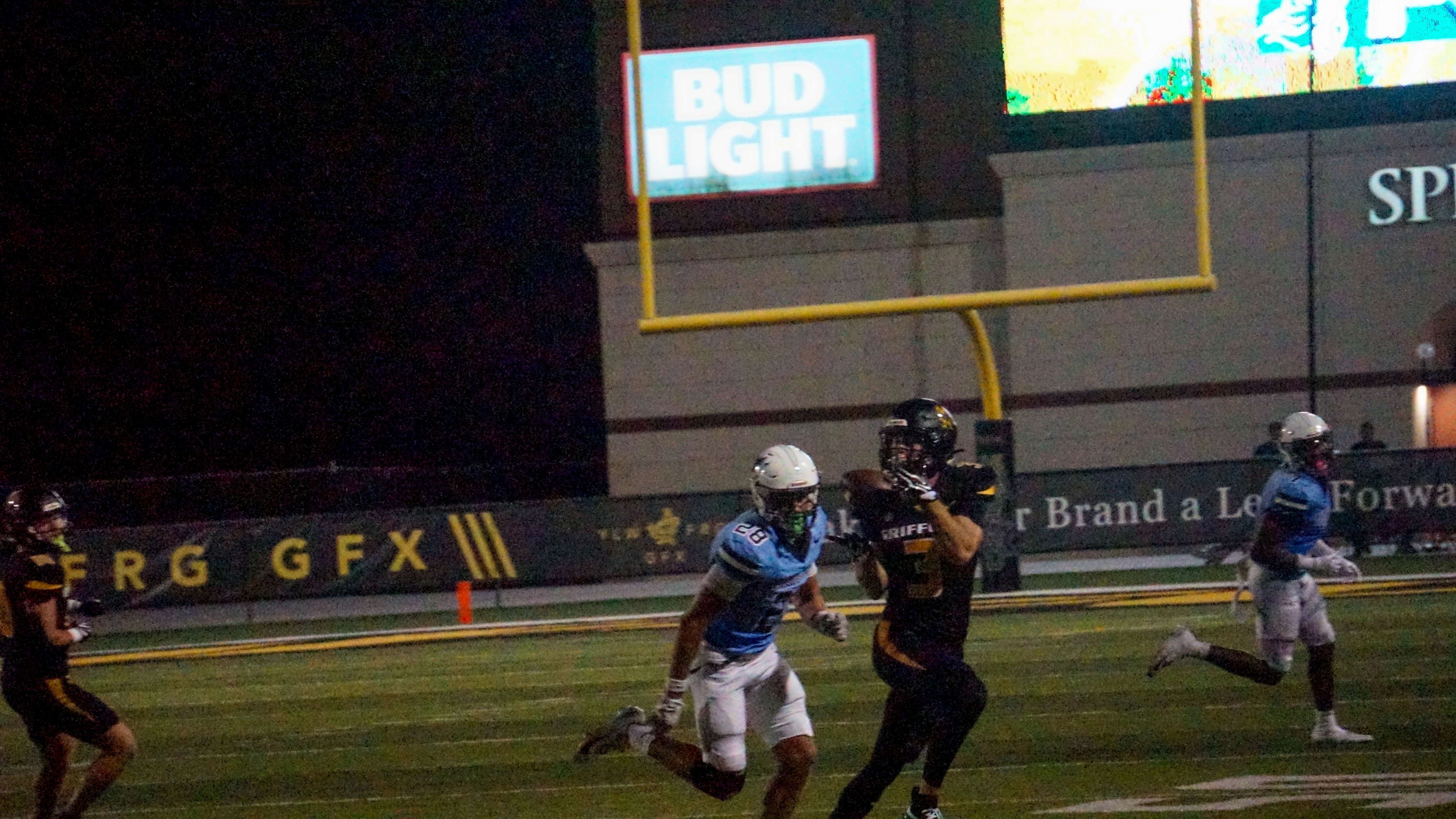 Austin Adair makes a catch near the sideline/ Photo by Matt Pike