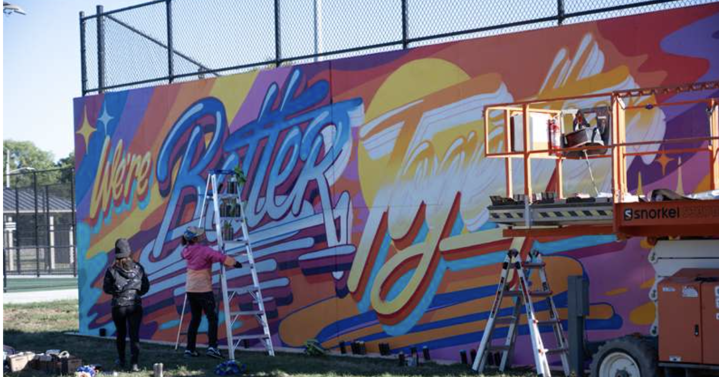 Filt Photo New York based artist Queen Andrea, or Andrea von Bugdoss finishes her mural for the BOOM! 2023 Mural Festival with her assistant on Saturday, Oct. 7, in Salina. Photo by Olivia Bergmeier