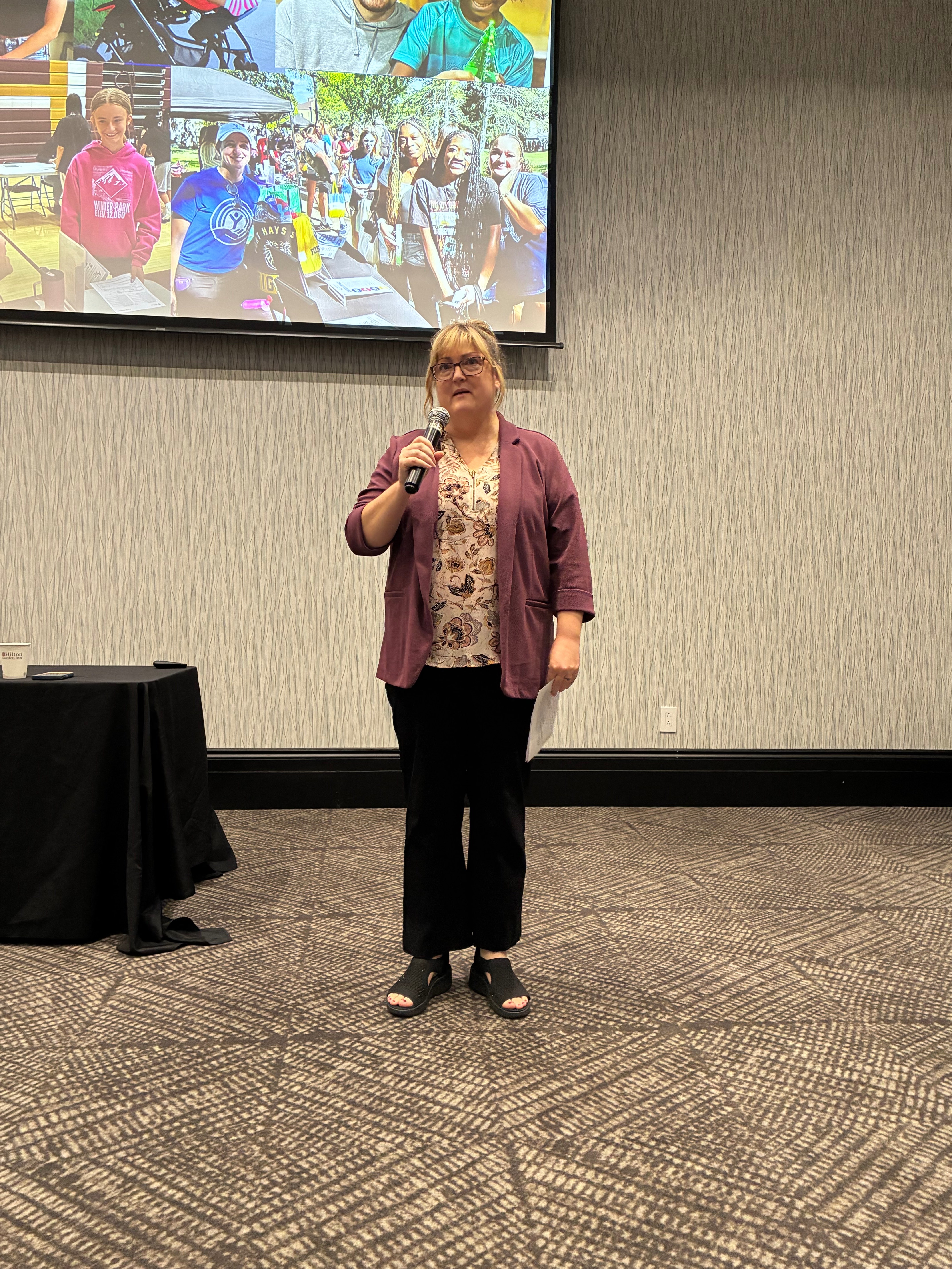 Tammy Wellbrock, longtime Big Brothers Big Sisters participant, speaks about her family’s experience with the organization during the United Way Kickoff Lunch on Friday in Hays. Photo by Alin Hett/Hays Post<br>