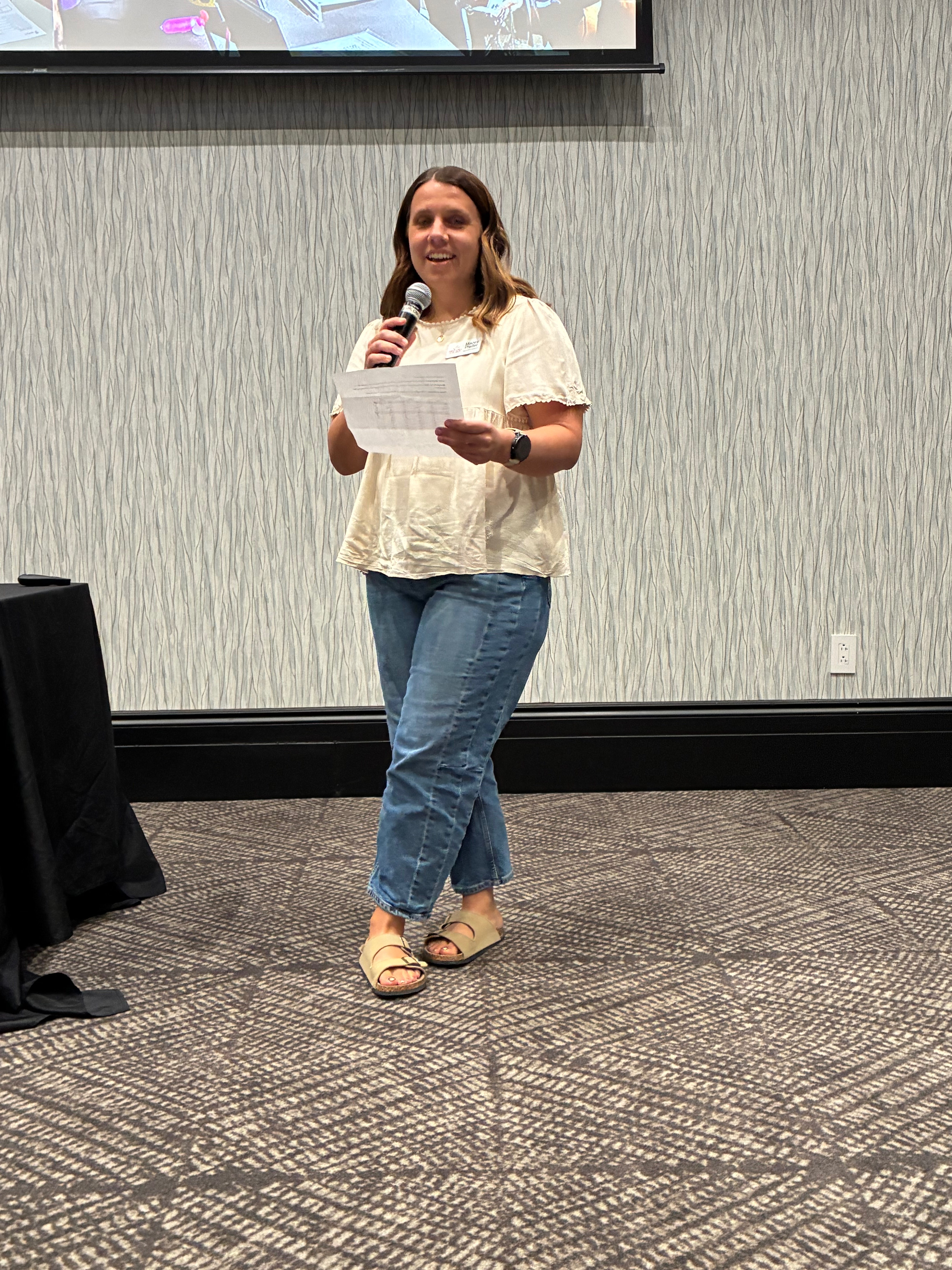 Macey Pfeifer, First Call for Help representative, discusses growing community needs and the services supported by United Way during the United Way Kickoff Lunch on Friday in Hays. Photo by Alin Hett/Hays Post<br>