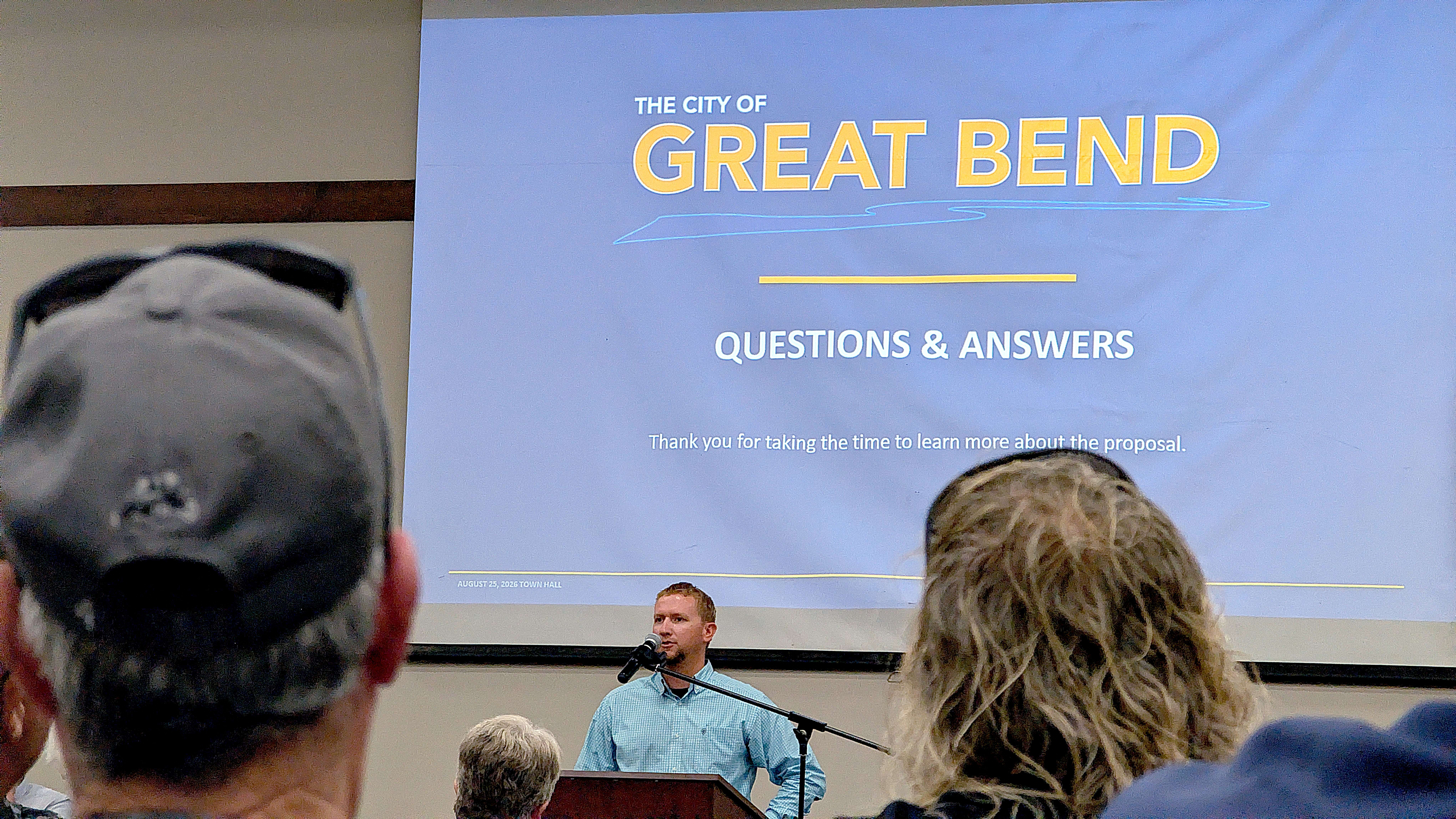 Great Bend City Administrator Logan Burns outlines the city’s sales tax proposal during a townhall meeting Tuesday night at the Great Bend Events Center. (photo by Dale Hogg)