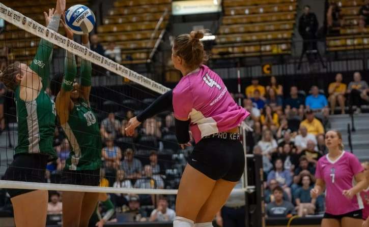 Fort Hays State senior outside hitter Peyton Bergschneider (4) attempts a kill in an NCAA volleyball match against Eastern New Mexico on Saturday, August 29, 2026 in Hays, Kan. (FHSU Athletics photo/Madyson Schliep)