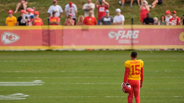 Kansas City Chiefs quarterback Patrick Mahomes walks to a drill during NFL football training camp Tuesday, Aug. 11, 2026, in St. Joseph, Mo. (AP Photo/Charlie Riedel)