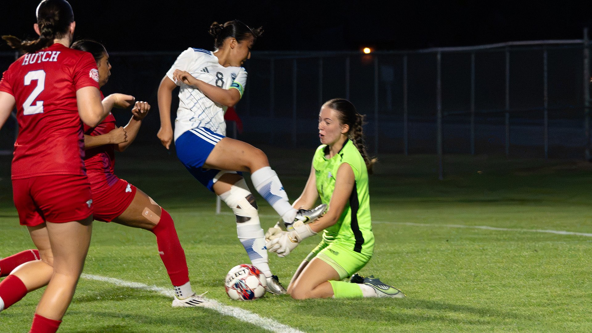 Freshman goalkeeper Hanna Helshani makes one of her season-high nine saves in the Blue Dragons' 2-1 loss to No. 5 Iowa Western on Friday night at the Salthawk Soccer Complex. (Abby Filippi/Blue Dragon Sports Information)