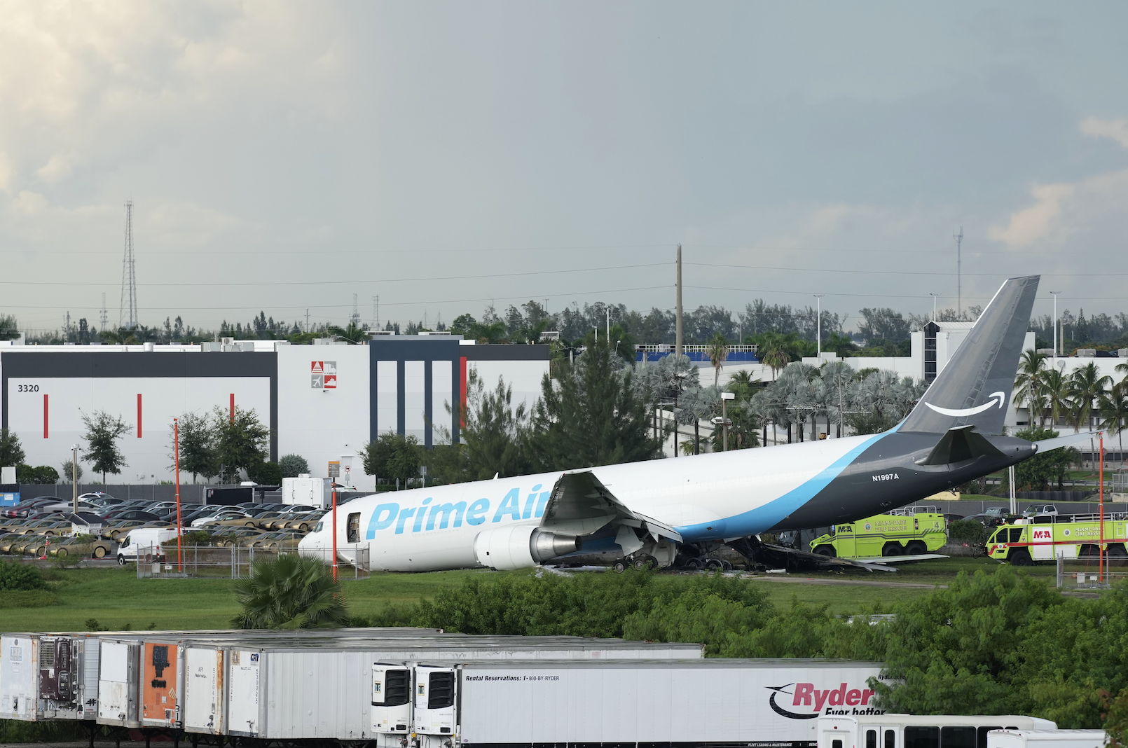 An Amazon cargo plane sits at the Miami International Airport (MIA) after it overshot the runway, Sunday, Sept. 6, 2026. (AP Photo/Lynne Sladky)