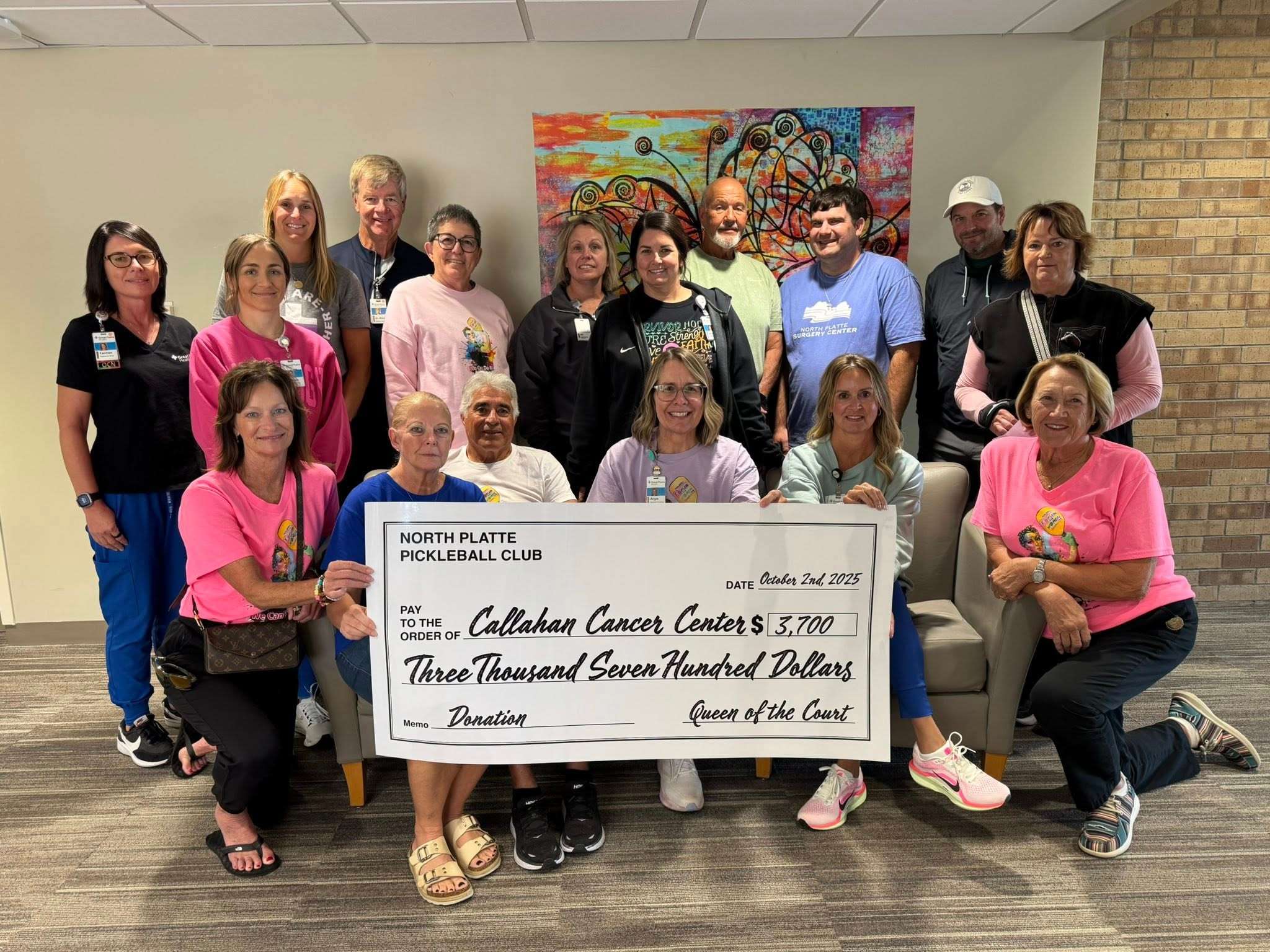 The North Platte Pickleball Club presented a $3,700 donation to the Callahan Cancer Center following the 2025 Queen of the Court fundraiser. The annual event returns September 19 for its fifth year, with all registration proceeds benefiting the Callahan Cancer Center. (Courtesy North Platte Pickleball Club)