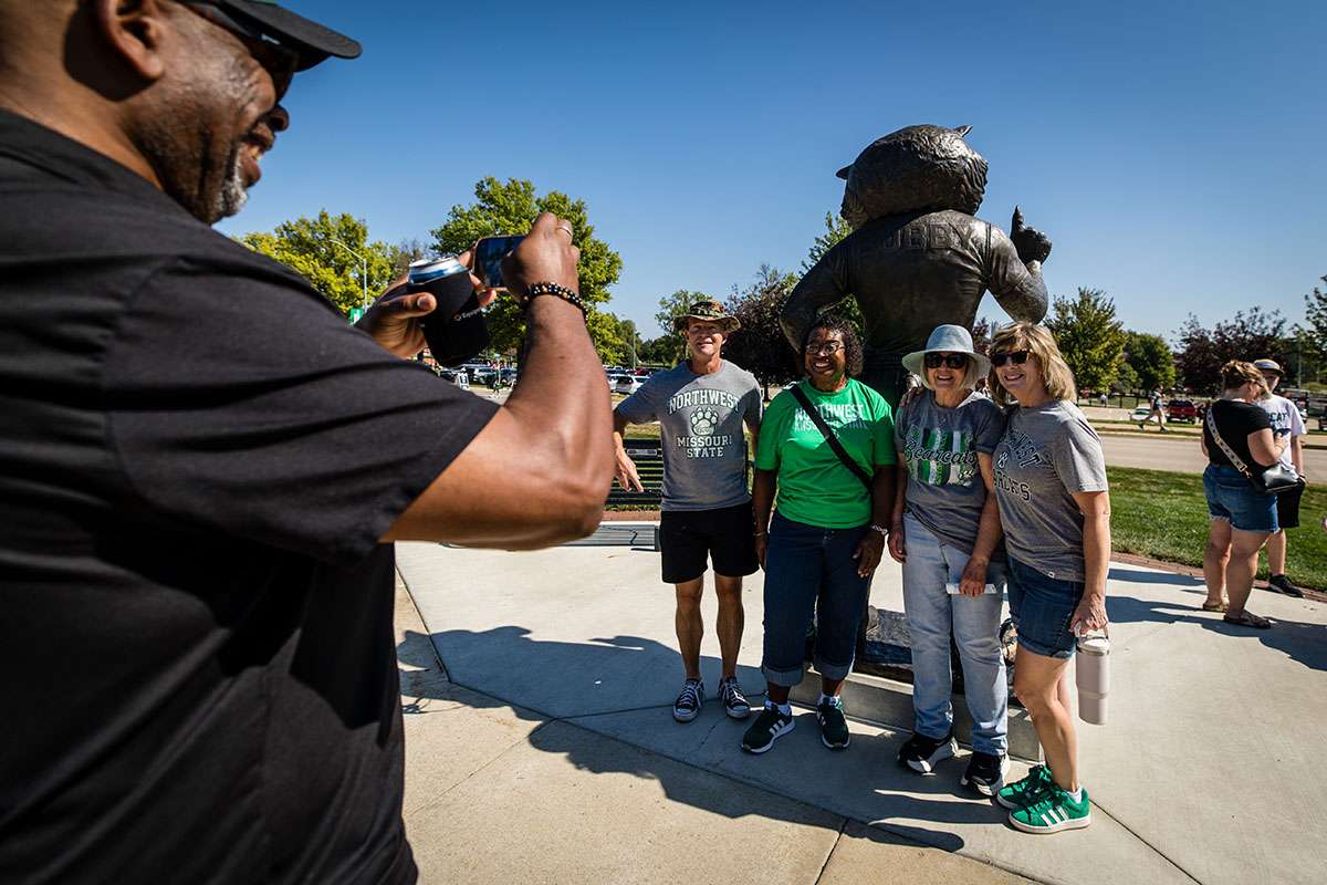 Northwest families and friends gathered at a statue of the university's mascot, Bobby Bearcat, during last year's Family Weekend activities/ Photo courtesy of Lilly Cook-Northwest Missouri State University