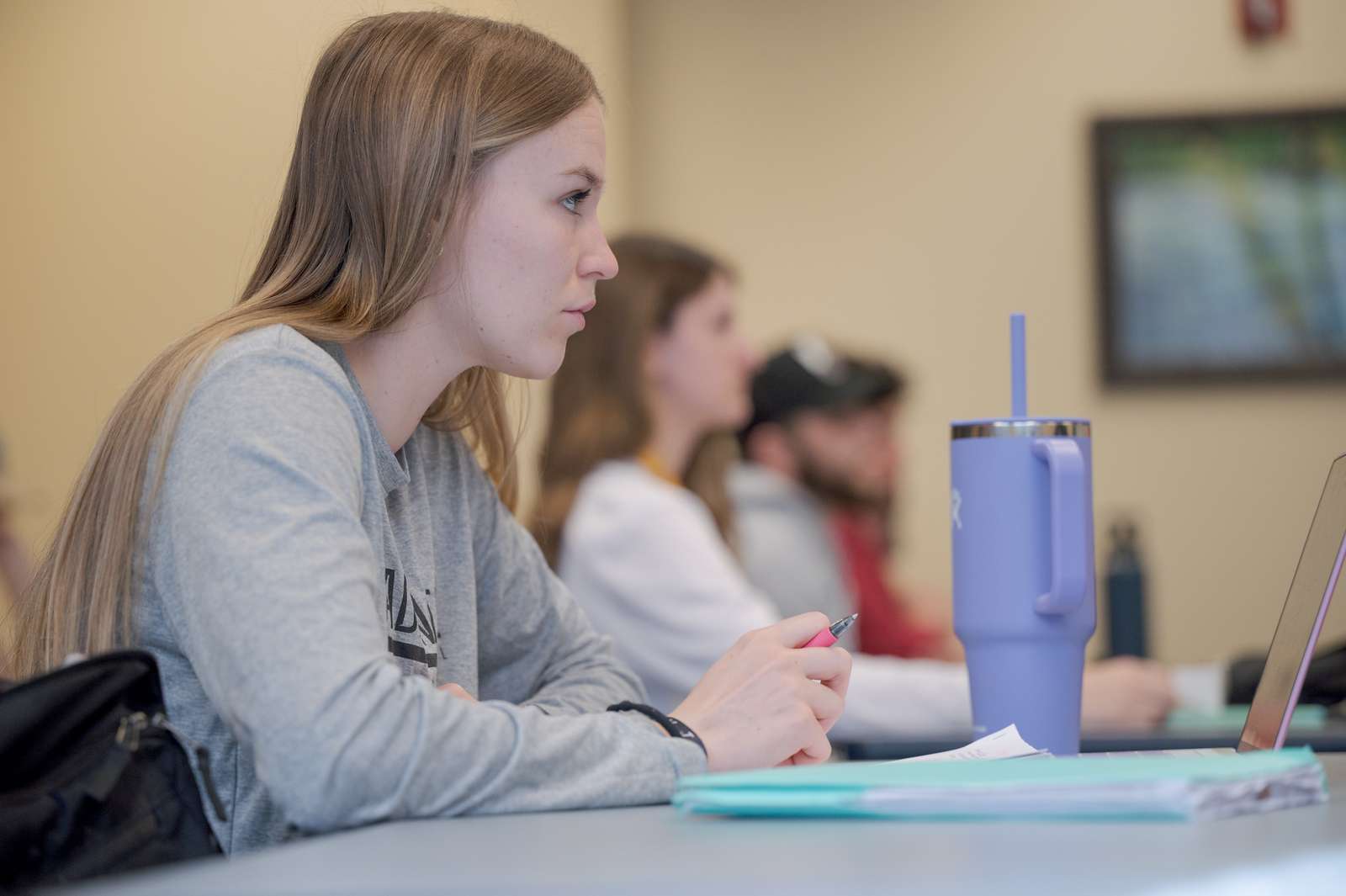 A Business student takes notes during class in April 2024. (Photo by Daniel Binkard/Chadron State College)