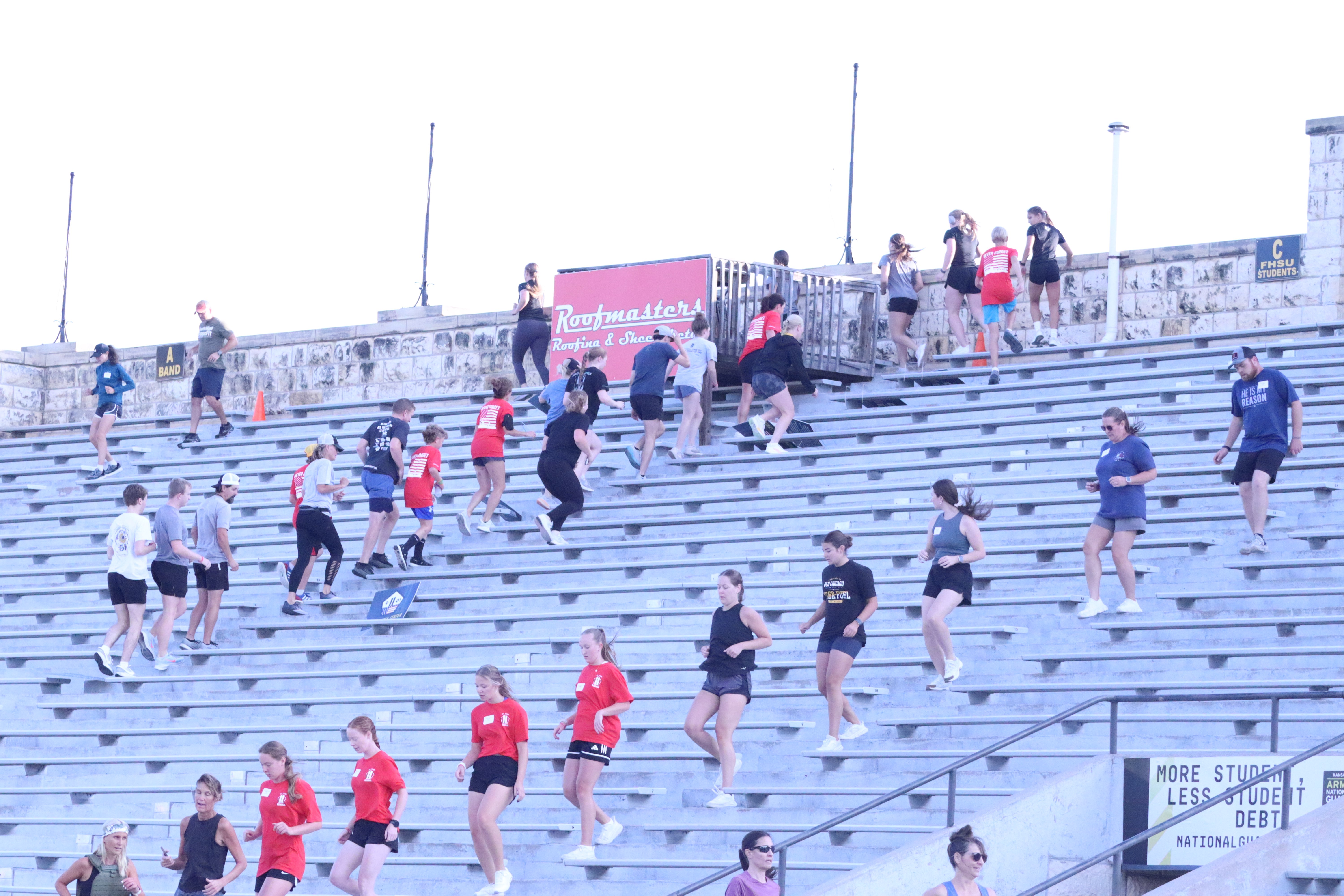 Participants run up and down the stairs at Lewis Field Stadium during the annual 9/11 Memorial Stair Climb.&nbsp;<br>