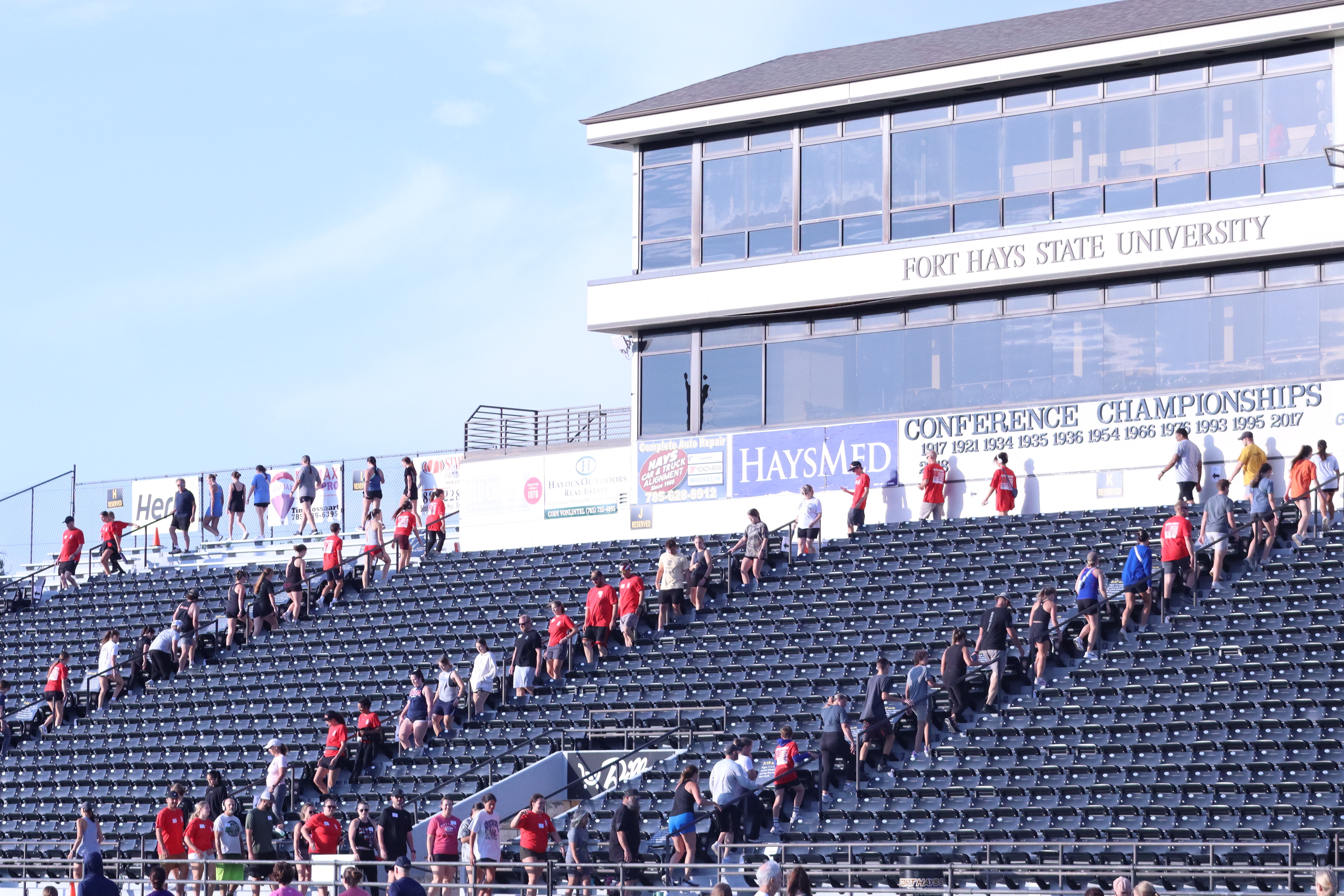Participants climb the stairs at Lewis Field Stadium during the annual 9/11 Memorial Stair Climb at Fort Hays State University. Participants completed 42 laps to reach the equivalent of 110 stories.&nbsp;<br>