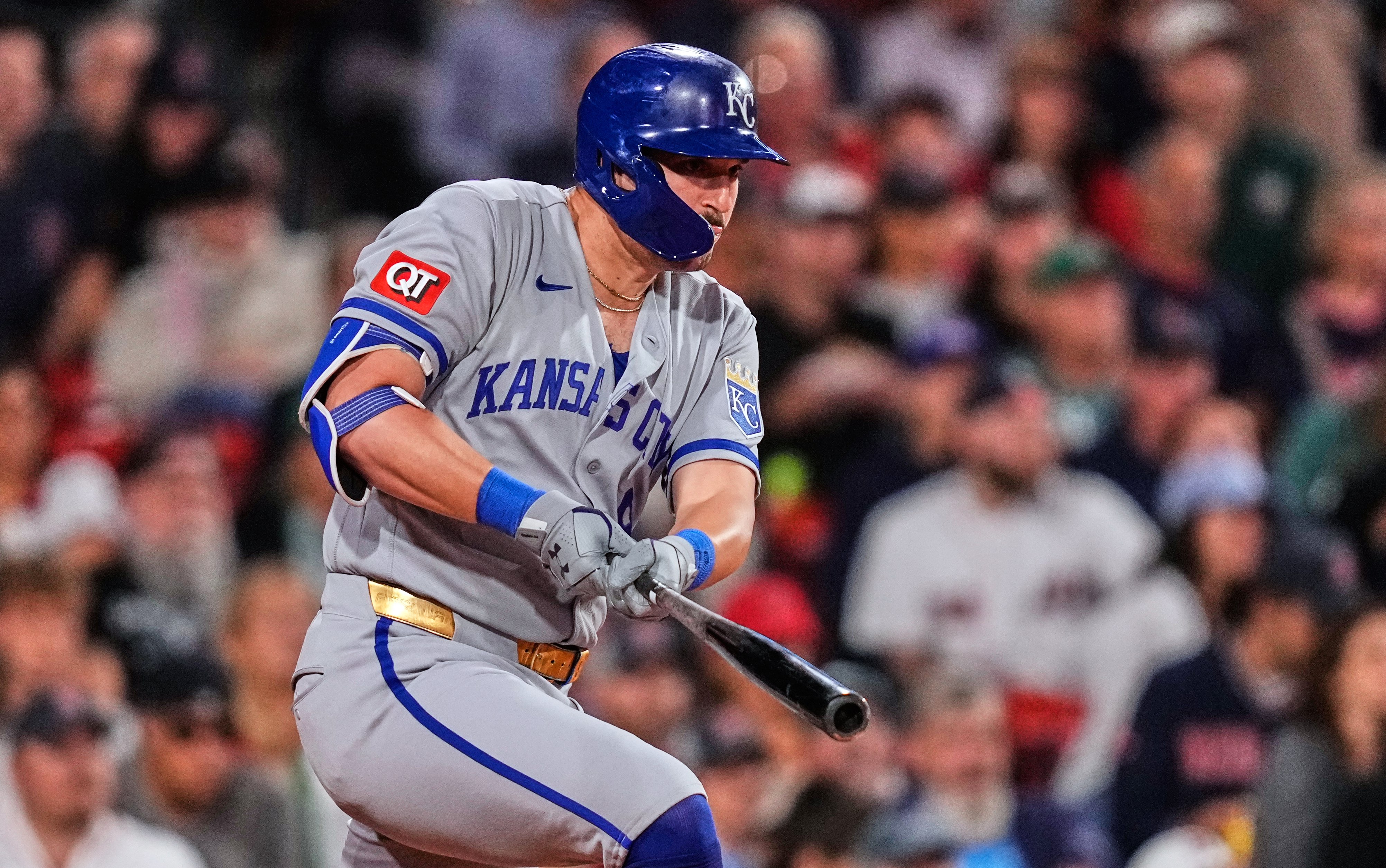 Kansas City Royals' Vinnie Pasquantino watches the flight of his RBI single during the third inning of a baseball game against the Boston Red Sox, Friday, Sept. 11, 2026, in Boston. (AP Photo/Charles Krupa)