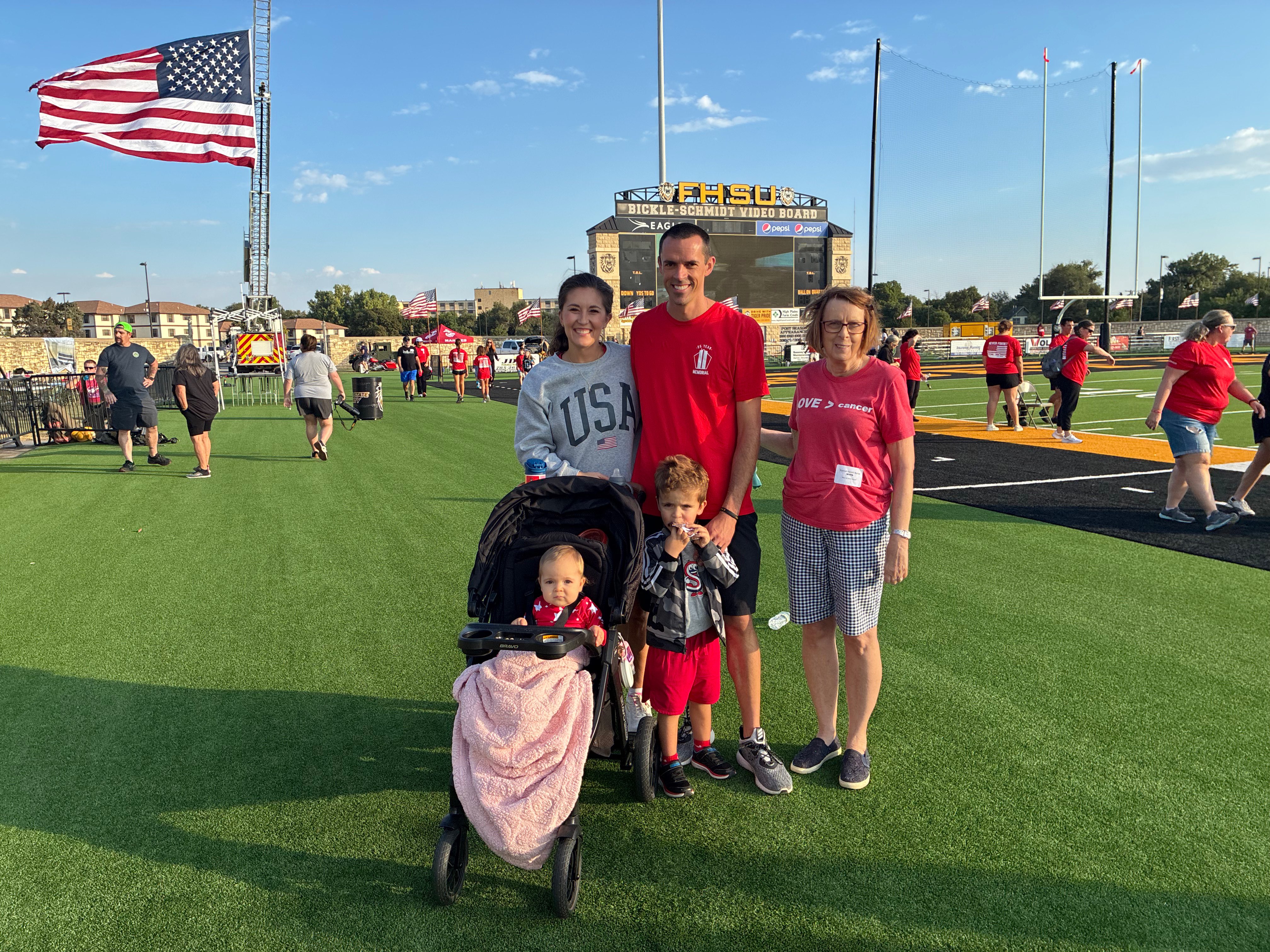 Drew Gannon, assistant professor for the health and human performance department and one of the organizers for the stair climb stands with his family. From left: Katelyn Gannon, Drew Gannon and Ann Gannon. Front row, from left: Alliah Gannon and Noah Gannon.&nbsp;