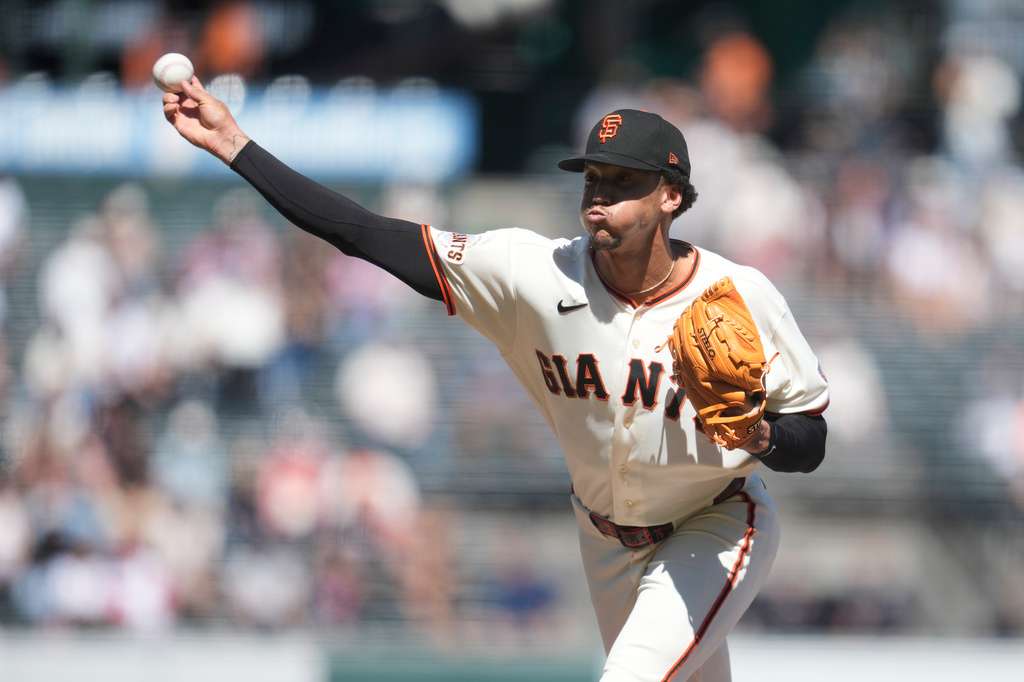 San Francisco Giants pitcher Spencer Bivens throws during a baseball game against the Cincinnati Reds, Wednesday, Aug. 26, 2026, in San Francisco. (AP Photo/Jeff Chiu)