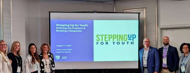 Marissa Woodmansee, far left, attended a conference in Chicago in her dual roles as Juvenile Services executive director and organizer of the local Stepping Up for Youth Initiative. Sarah Schenek, fourth from left, licensed clinical professional counselor at Willow Tree Therapy Services, Great Bend, also participated.