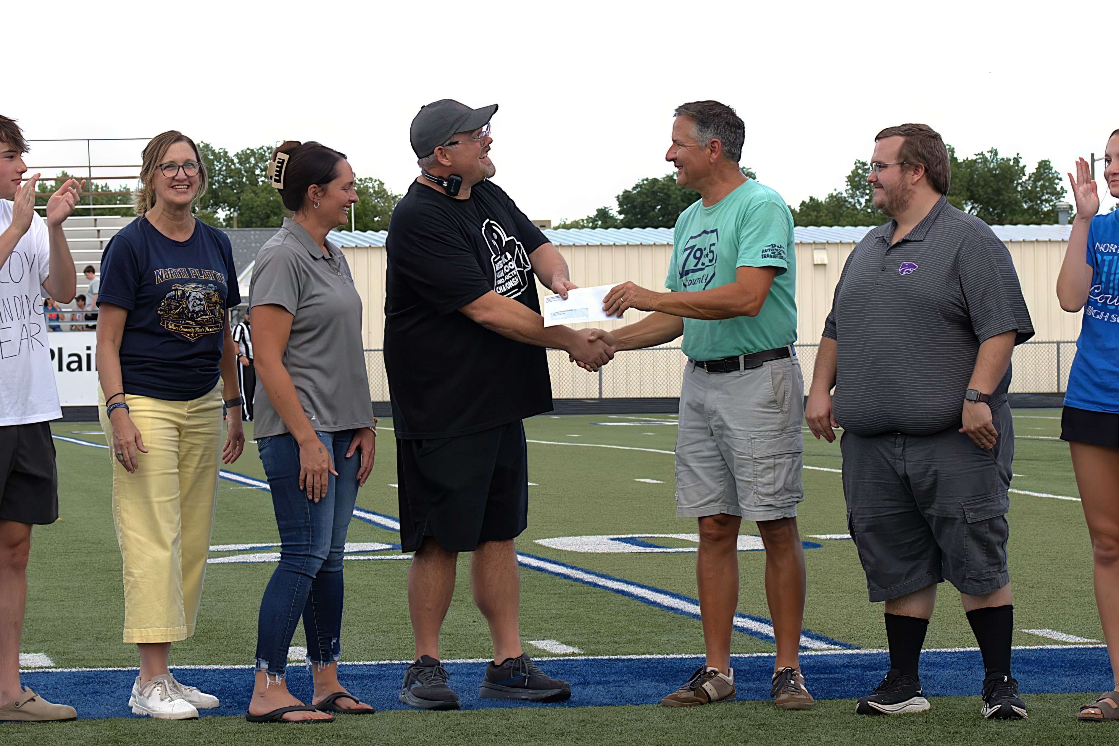 Representatives of Eagle Radio and the Schmidt Foundation present a $20,000 donation to the North Platte Public Schools Foundation to support the expansion of the Bulldog Productions Creative Lab at North Platte High School. (Courtesy Photo)
