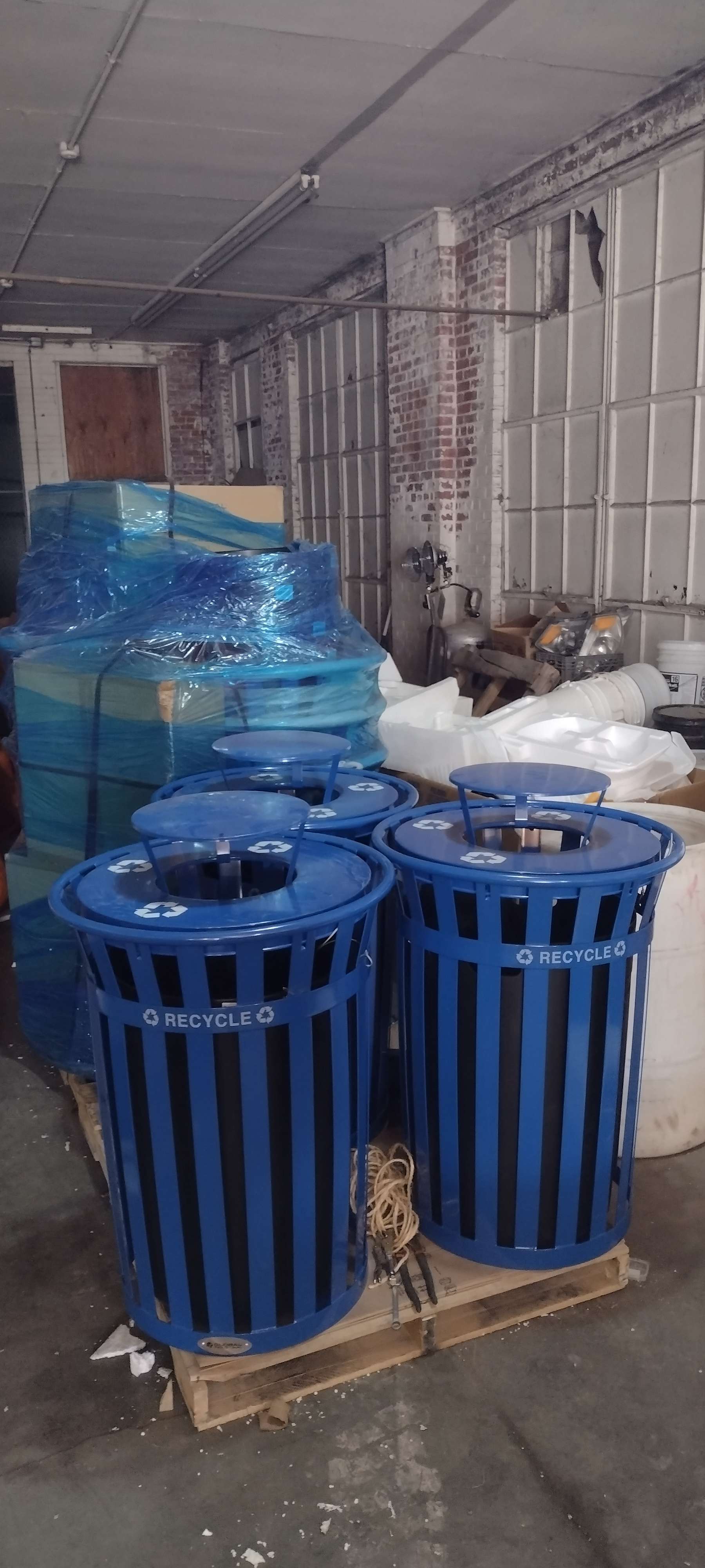 A set of recycling containers awaiting decals before being placed along Box Butte Avenue.