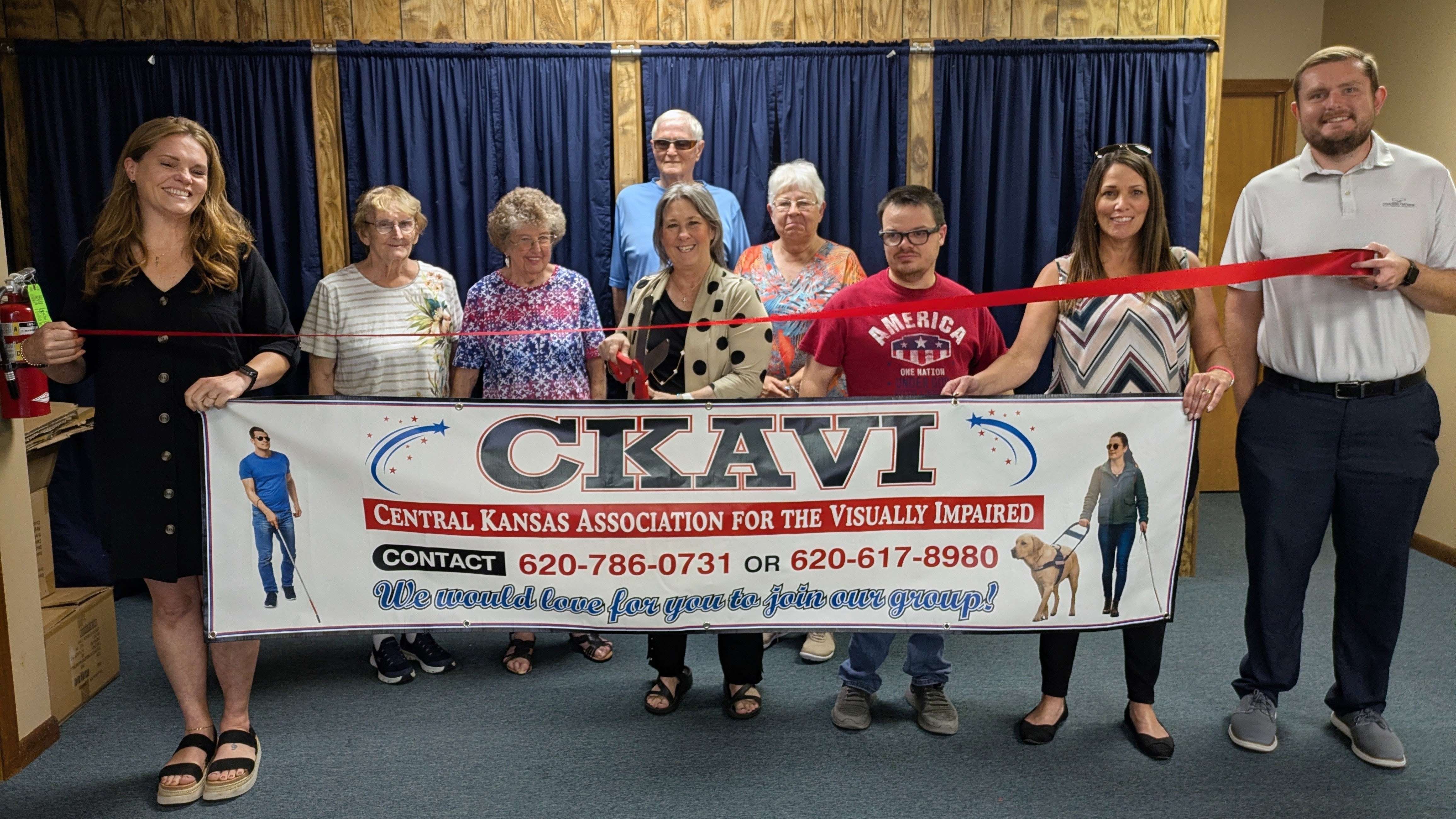 Chamber representatives and community supporters join the Central Kansas Association for the Visually Impaired for a ribbon cutting recognizing more than four decades of support, education and encouragement for individuals experiencing blindness or vision loss throughout Central Kansas. (photo courtesy of the Great Bend Chamber of Commerce)