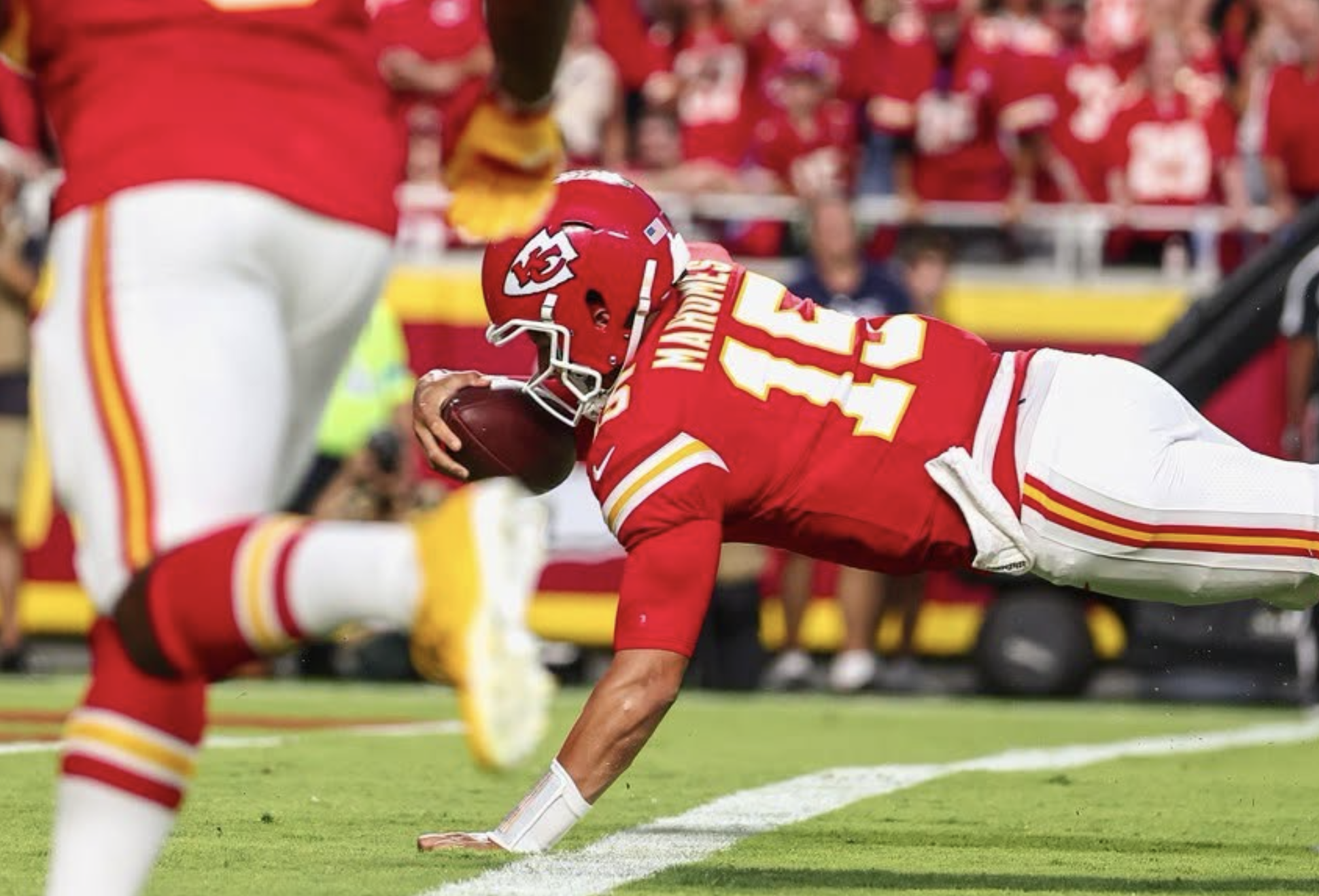 Kansas City Chiefs quarterback Patrick Mahomes (15) dives into the endzone in the first half of their season opener vs. the Denver Broncos on Monday, September 14, 2026 in Kansas City, Mo. (Kansas City Chiefs photo)