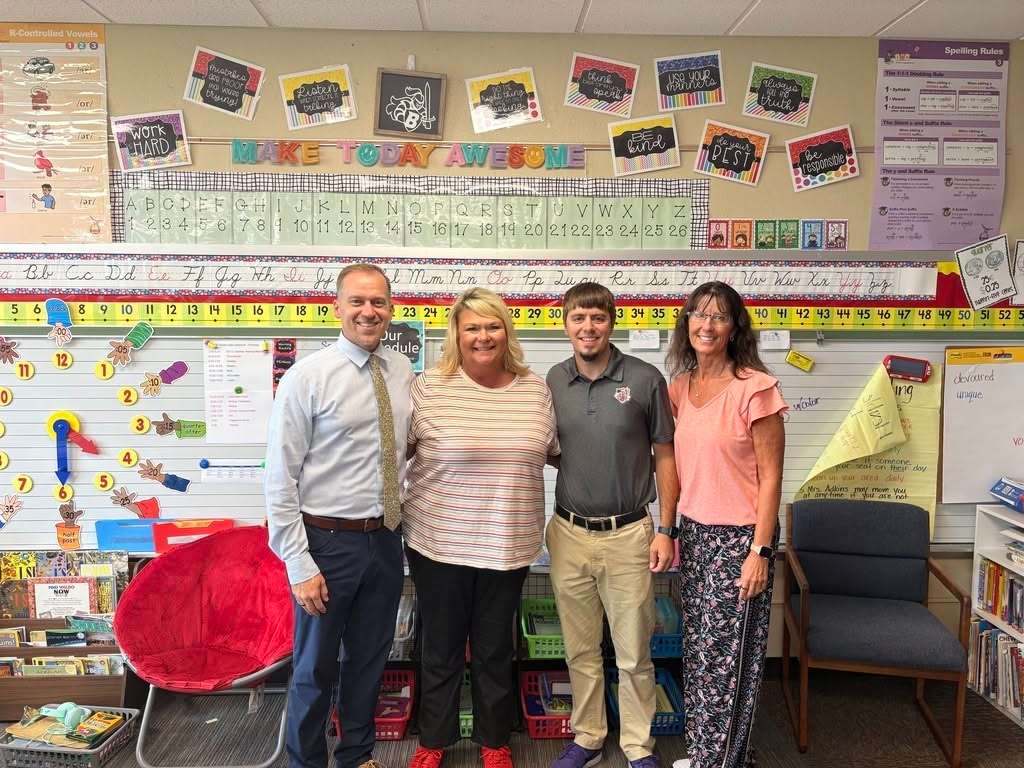 Pictured L-R Kurt Geilenfeldt, Principal - Buhler Grade School, Shelly Cole K-5 Music Teacher - Buhler Grade School, Kyle McClure - Director of Curriculum, Instruction, and Assessment PK-5th Grade, Cindy Couchman, Superintendent
